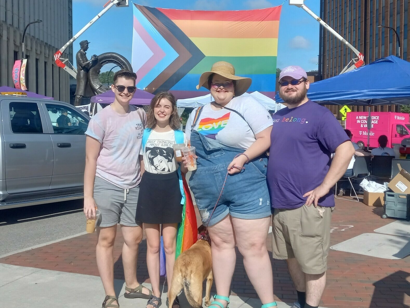 From left to right, Israel, Elizabeth, Tatiana and her husband at a Pride parade in summer 2022.