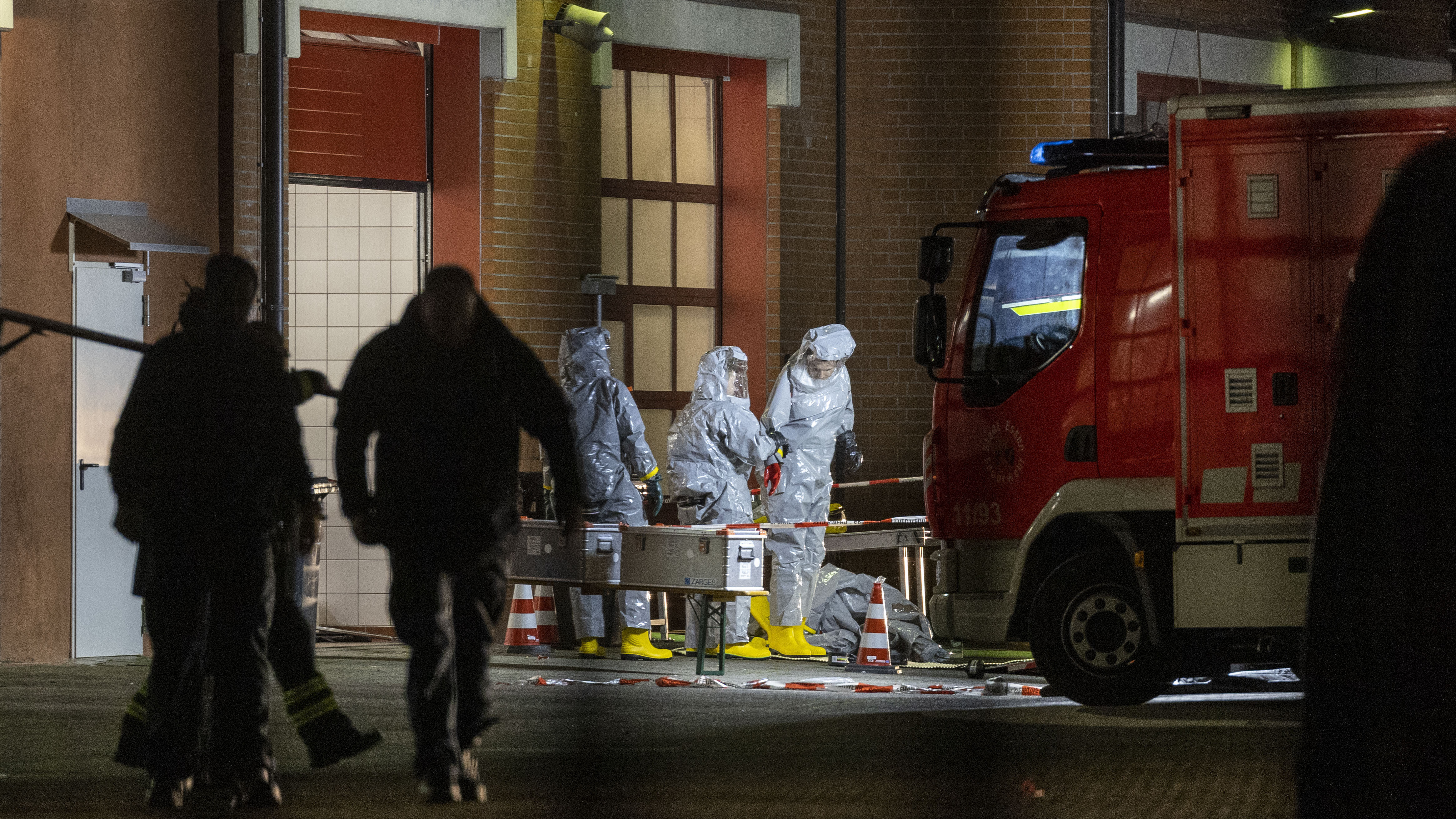 Substances found during the search are examined on the premises of the fire department in Castrop-Rauxel, Sunday, Jan.8, 2023. In Castrop-Rauxel, there was a large-scale operation by the police and fire department on Saturday evening. A special task force (SEK) was also on the scene, a police spokeswoman told the German Press Agency on Saturday evening.