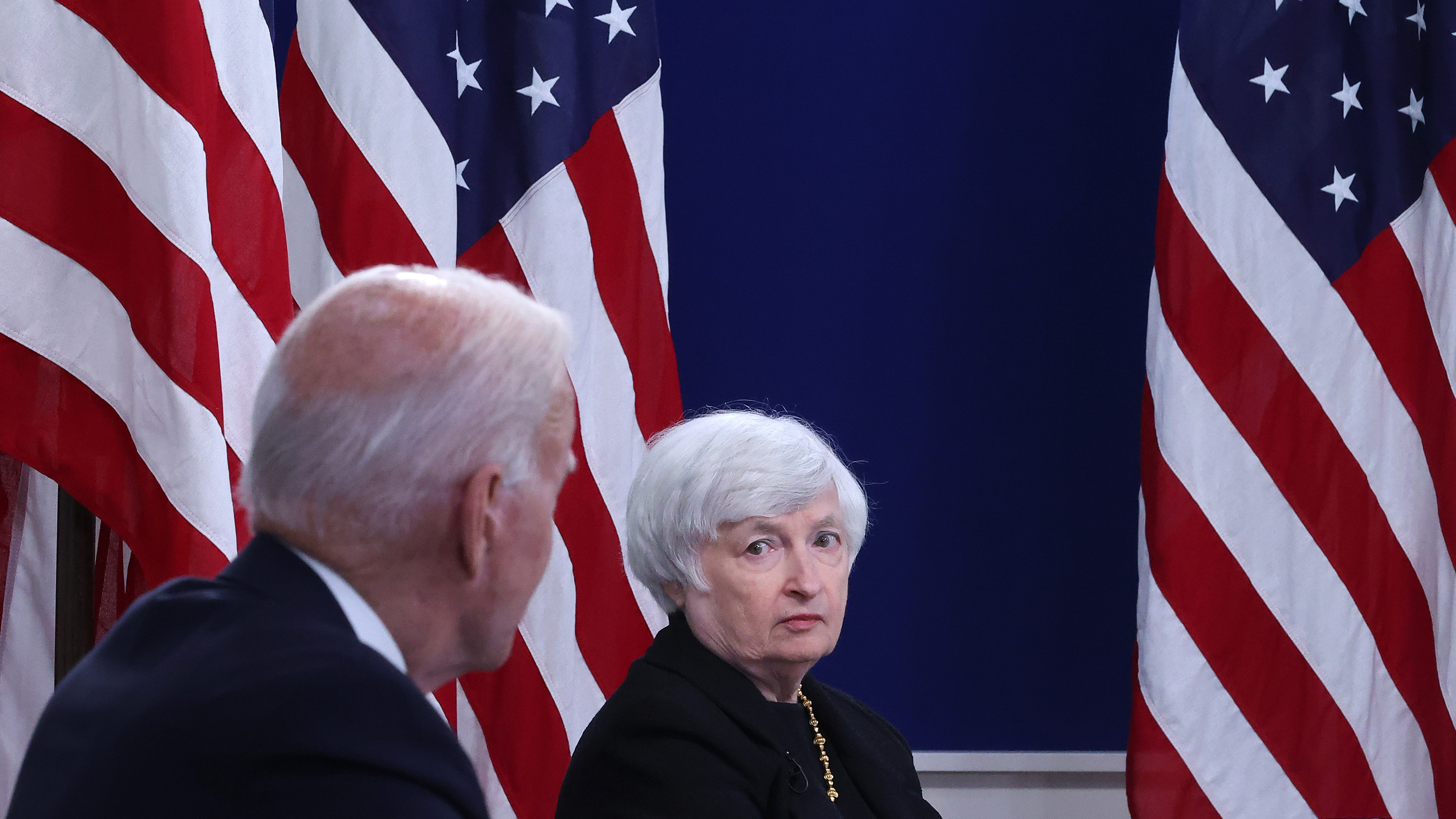 U.S. Treasury Secretary Janet Yellen listens to President Biden discuss the federal debt limit on Oct. 6, 2021, in Washington, D.C.