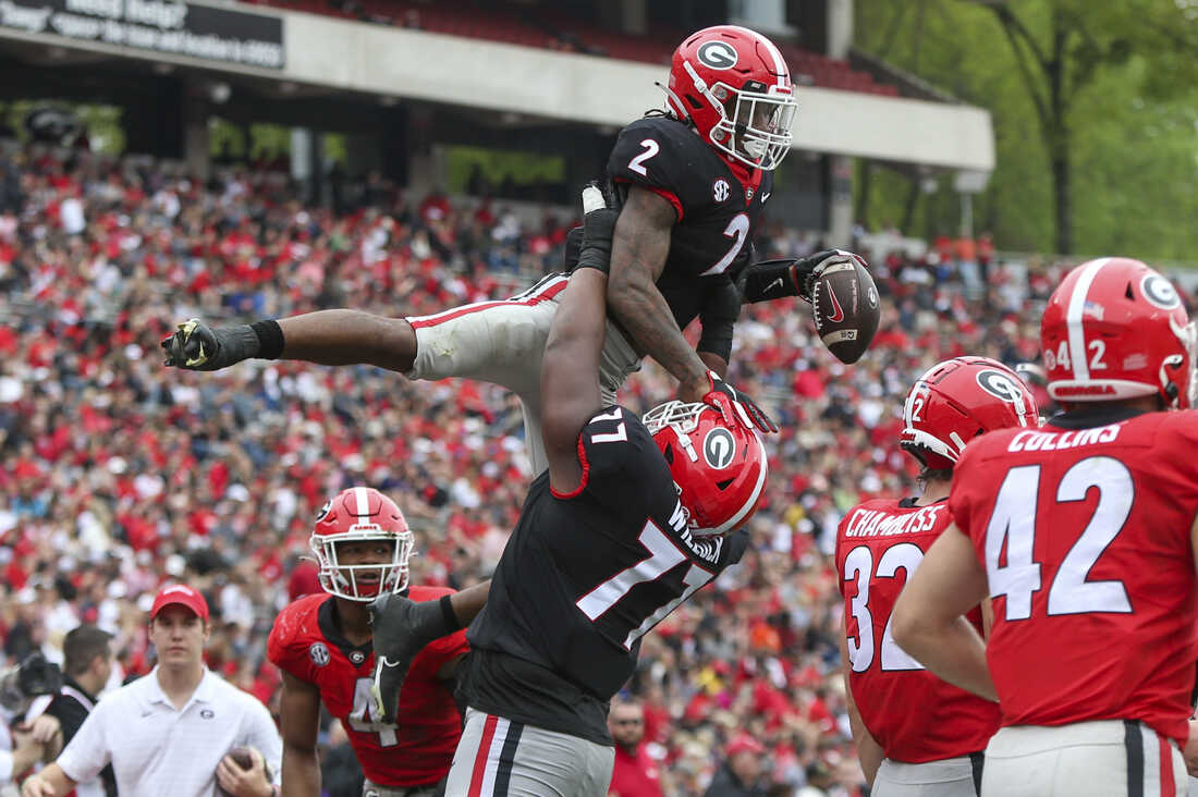 U. of Georgia football player, staffer die in car crash after victory  parade : NPR