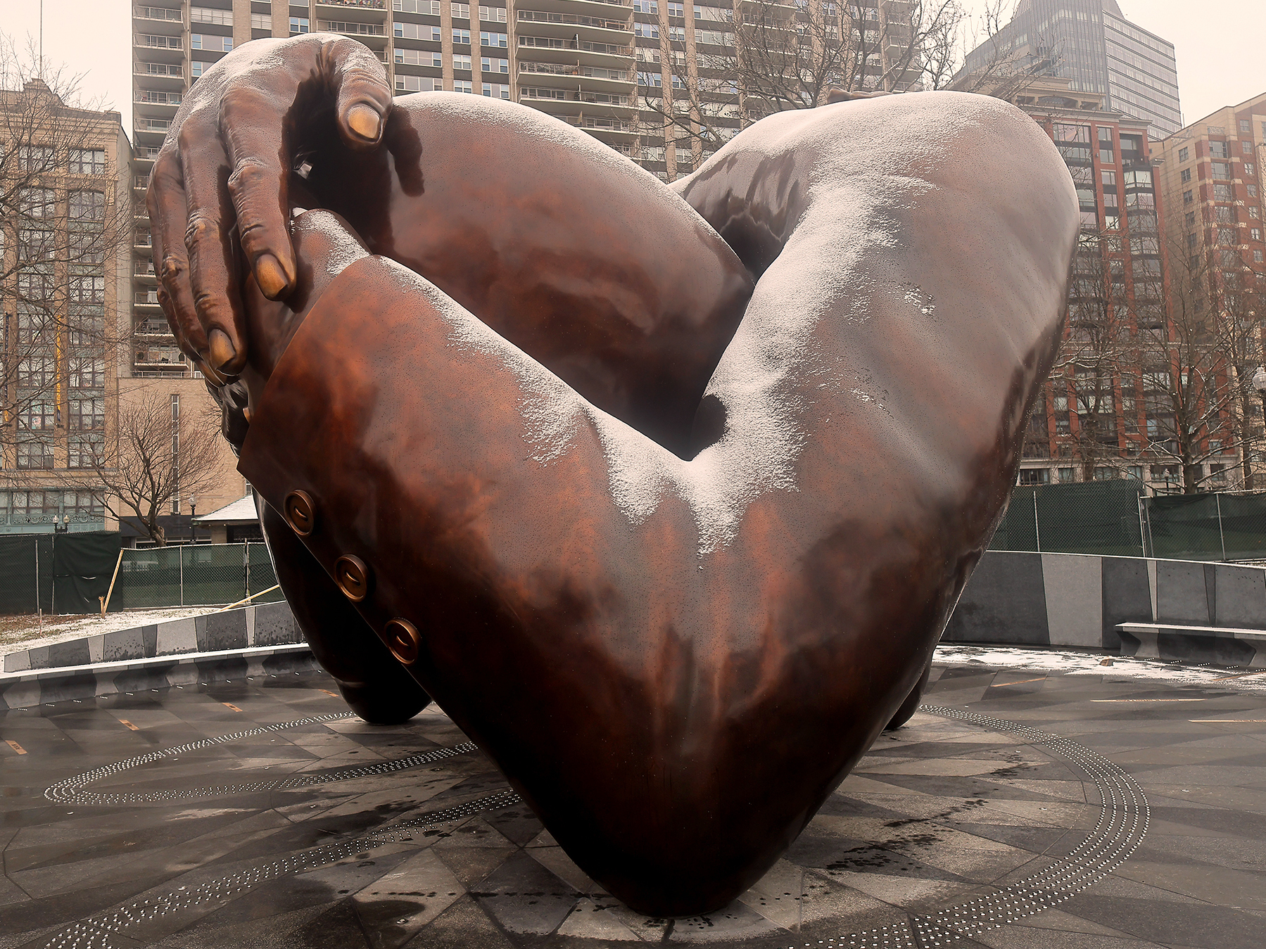 The Embrace, the new memorial sculpture in Boston made in tribute to Martin Luther King Jr. and Coretta Scott King, was unveiled on Friday. (Boston Globe via Getty Images)