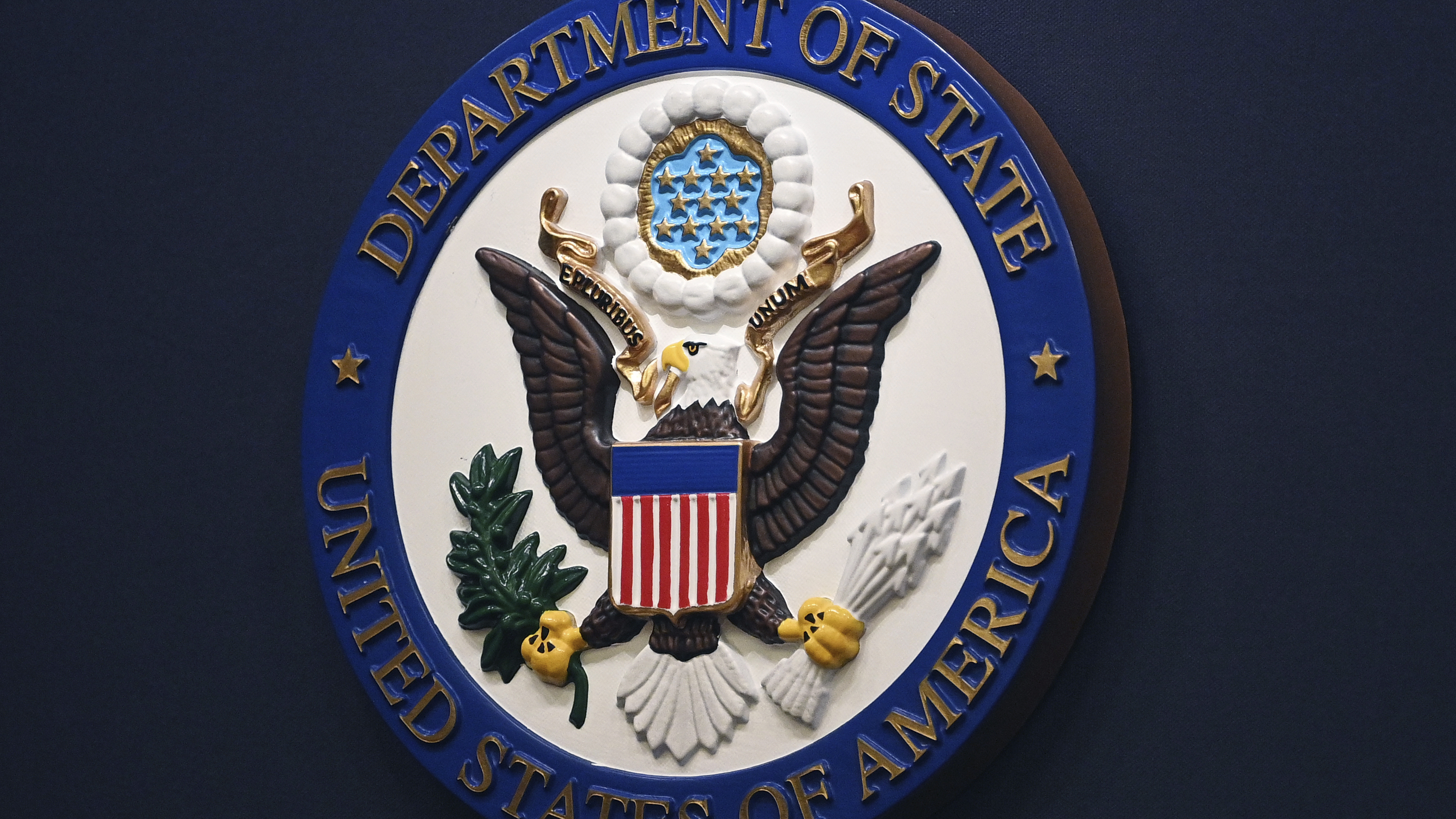 The State Department seal is seen on the briefing room lectern at the State Department in Washington, D.C., on Jan. 31, 2022.