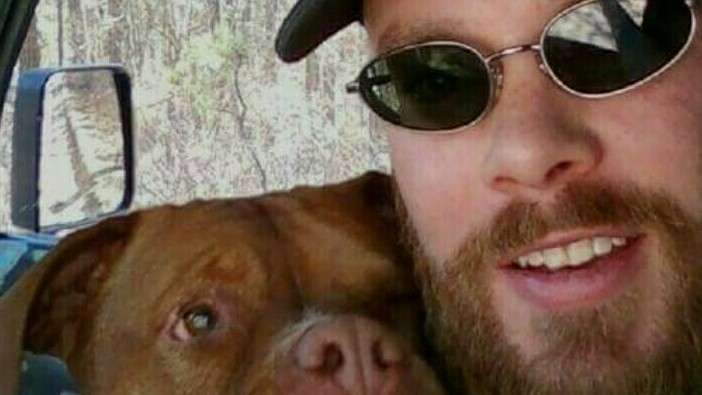 Rich Osthoff and Sapphire, a pit bull who he said saved his life. Osthoff told NPR that Rep. George Santos launched a GoFundMe campaign to raise $3,000 for a surgery for the dog in 2016 â and then kept the money.