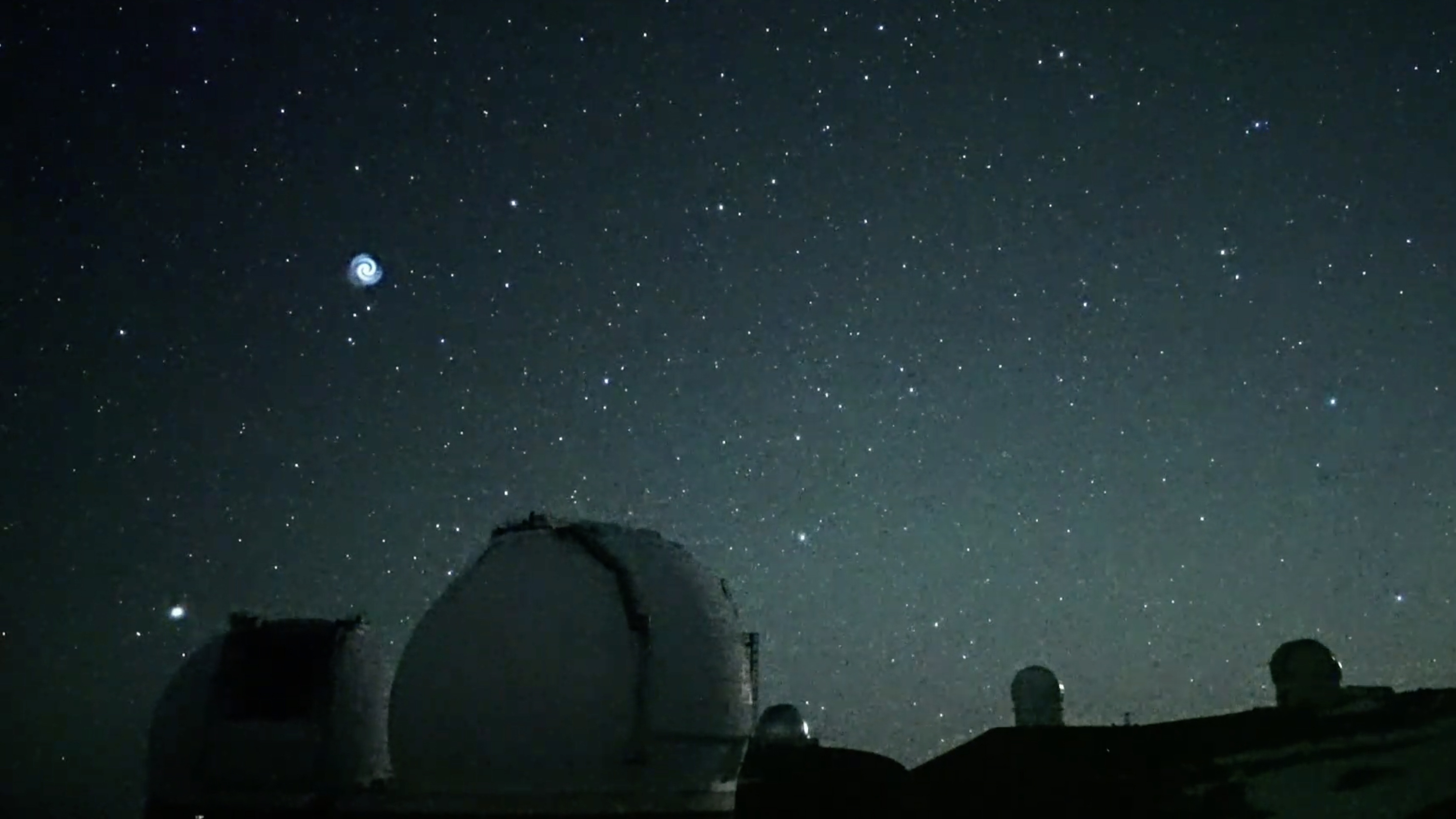 A "mysterious" flying spiral spotted by the Subaru Telescope on Mauna Kea, Hawaii, early on Jan. 18, could be related to a SpaceX satellite launch earlier in the day, scientists speculated.