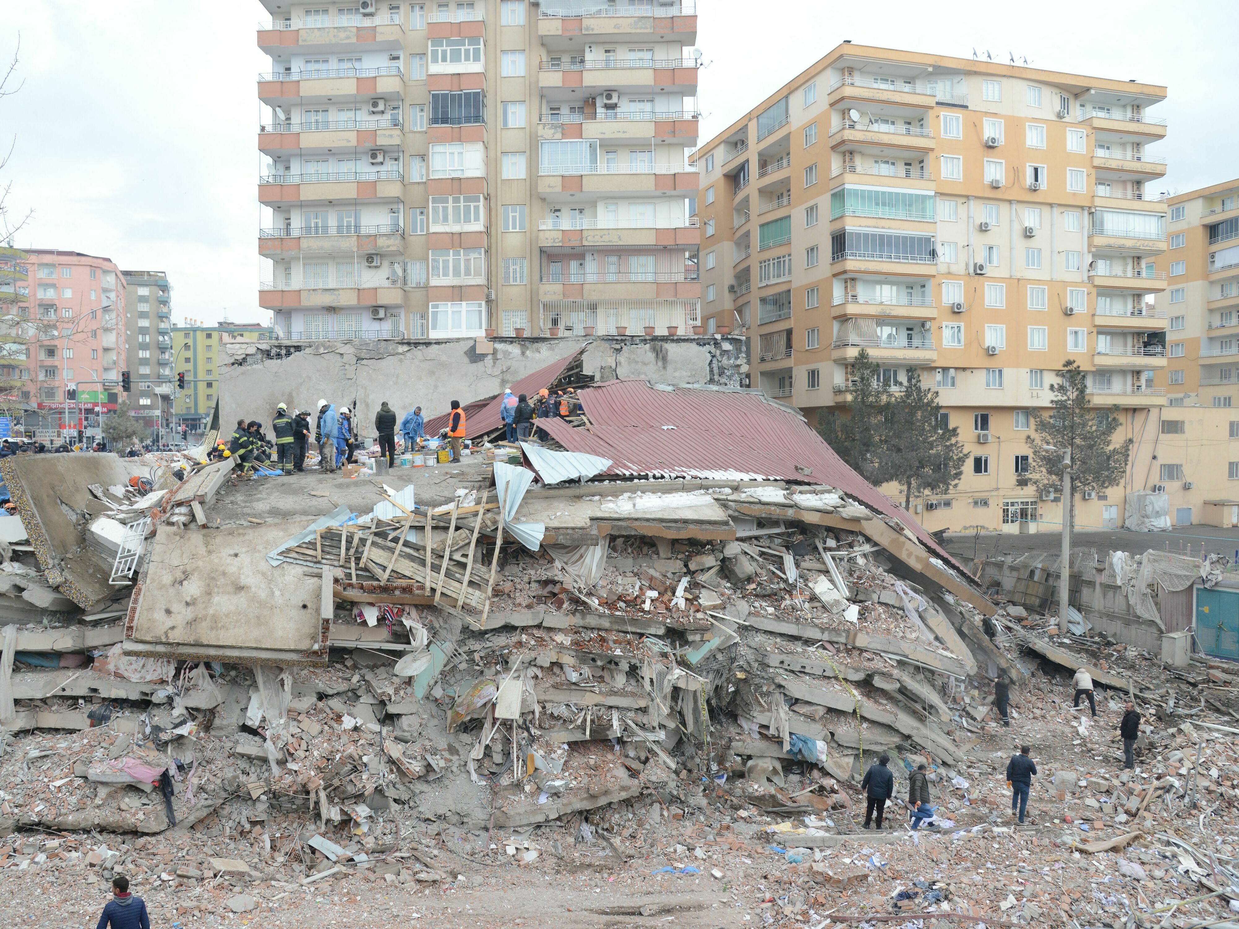Rescue teams are conducting search and rescue operations in Diyarbakir and other parts of southeastern Turkey that were hit by powerful earthquakes on Monday. Anyone claiming to predict quakes, a seismologist tells NPR, is making &quot;scattershot&quot; predictions. (AFP via Getty Images)