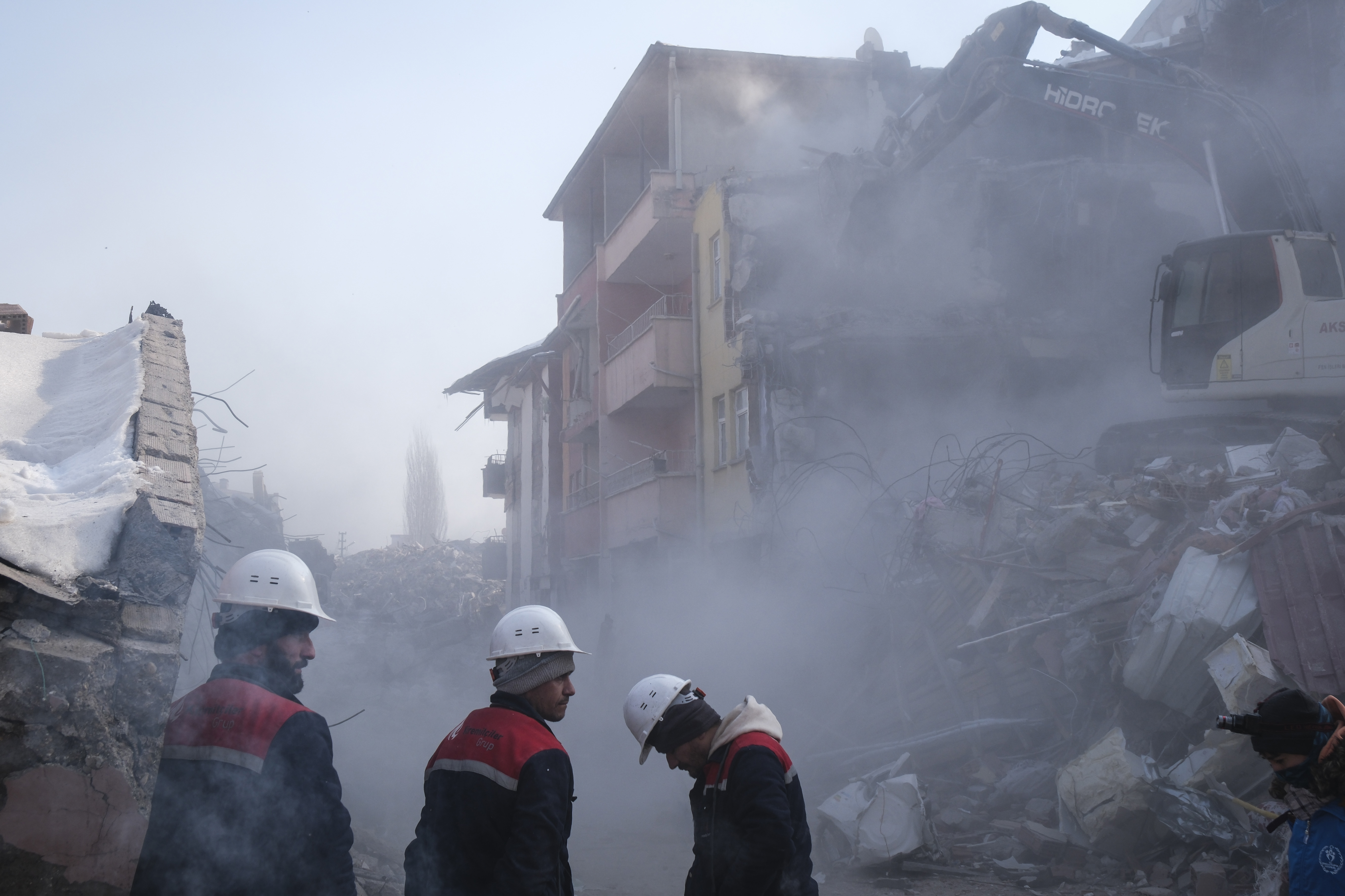 Volunteers and rescue teams work a scene outside of a collapsed building in Elbistan Turkey on Friday. A 7.8-magnitude earthquake hit near Gaziantep, Turkey, in the early hours of Monday, followed by another 7.5-magnitude tremor just after midday. (Getty Images)