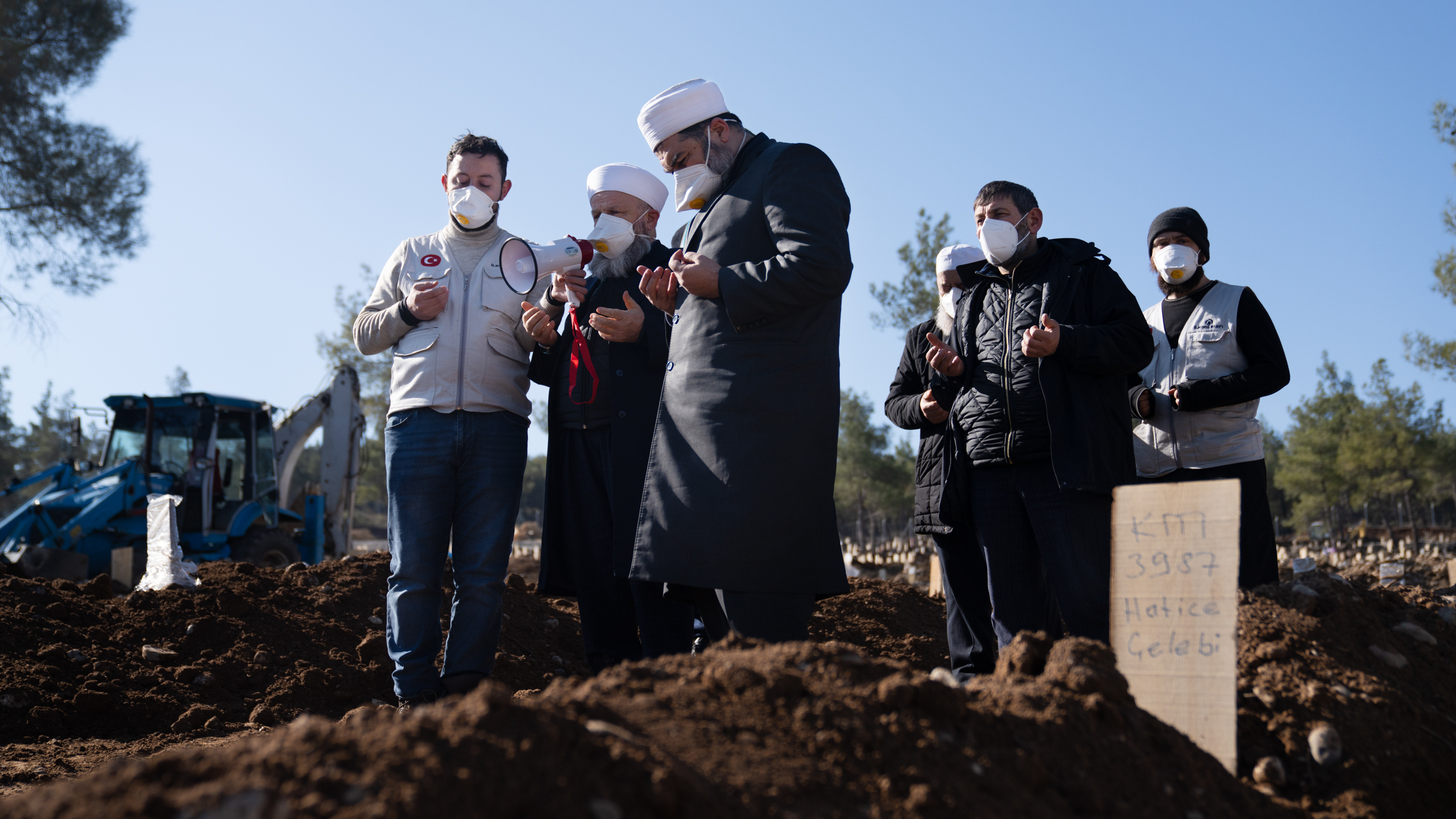 Turkey buries its earthquake dead in small cemeteries and mass graves