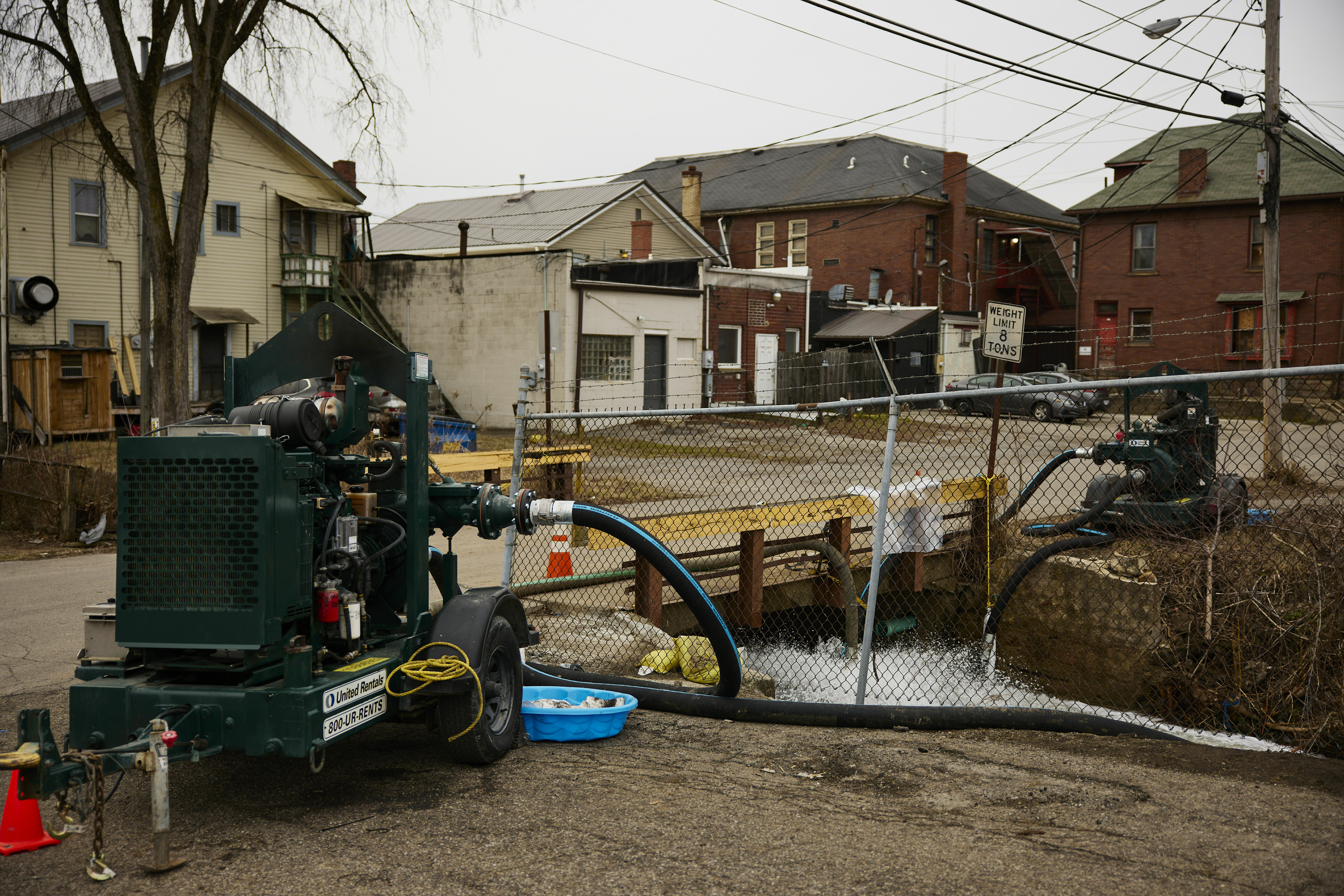 Water is pumped into a creek for aeration in East Palestine, Ohio, on Tuesday, more than a week after a train derailment released toxic chemicals. (Getty Images)