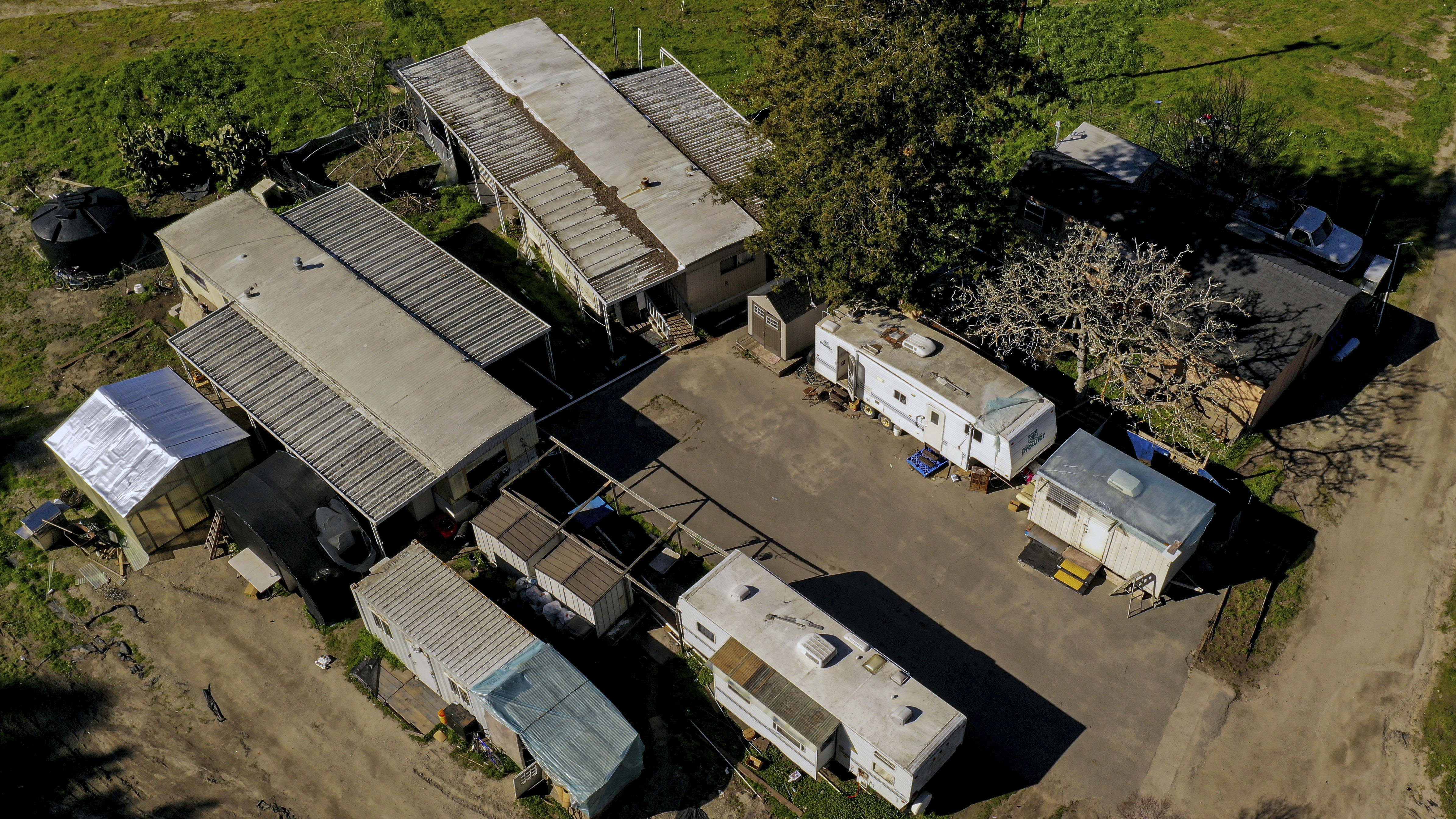 The suspect charged with killing 7 people at 2 California farms pleads not guilty