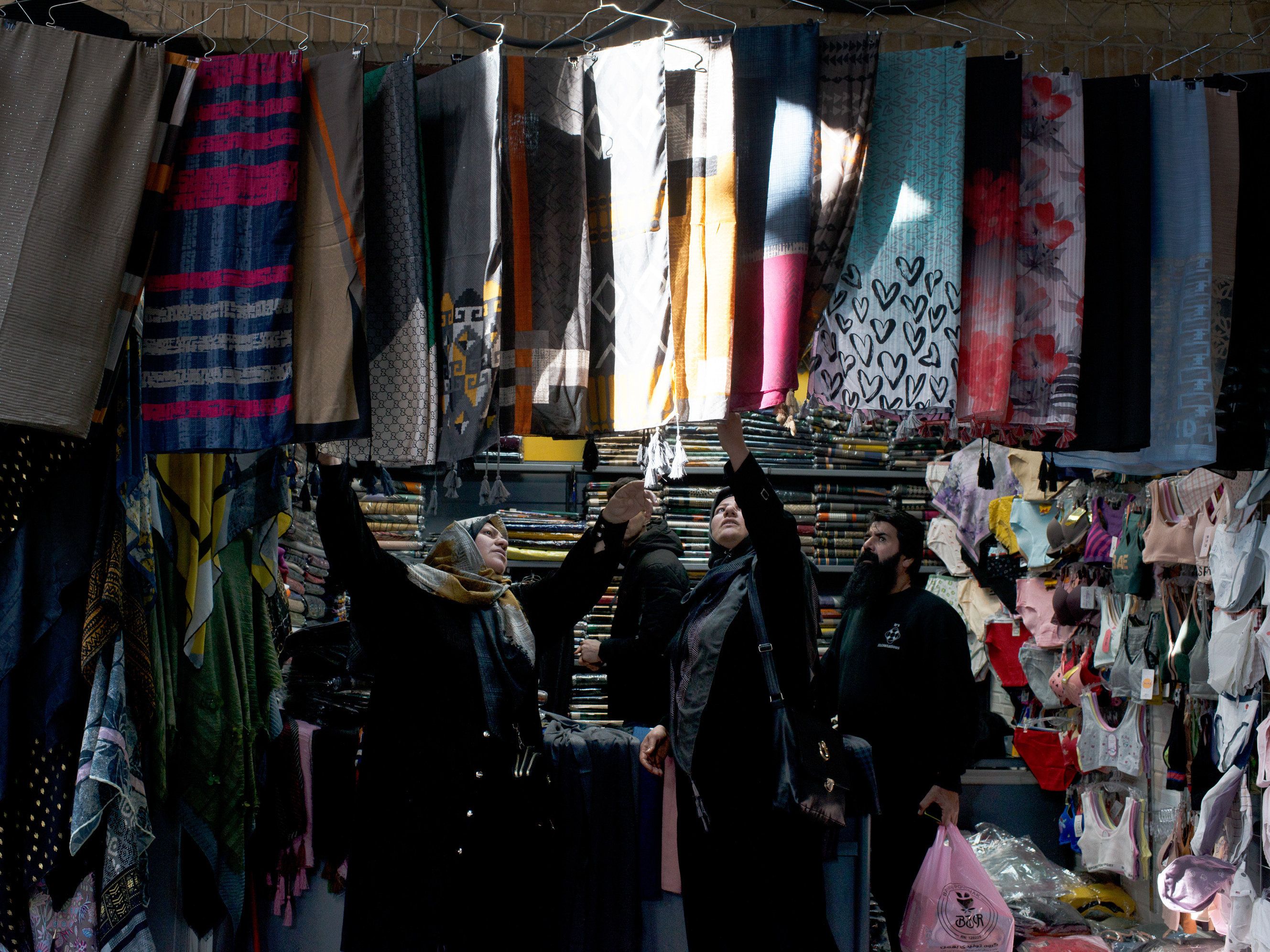Women shop for head scarves at the Grand Bazaar.