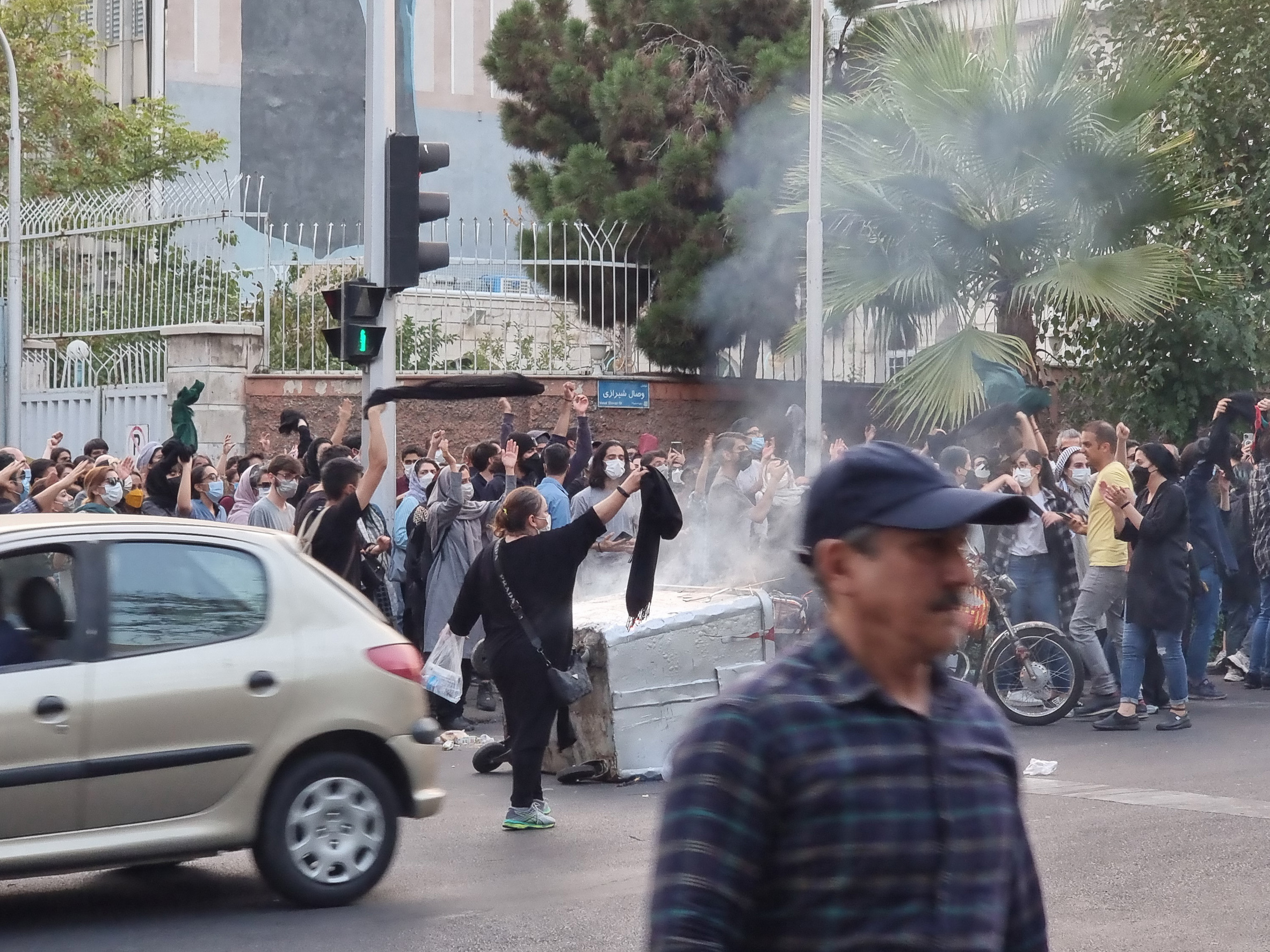 People gather on the streets of Tehran on Sept. 19 last year in protest against the death of Mahsa Amini.