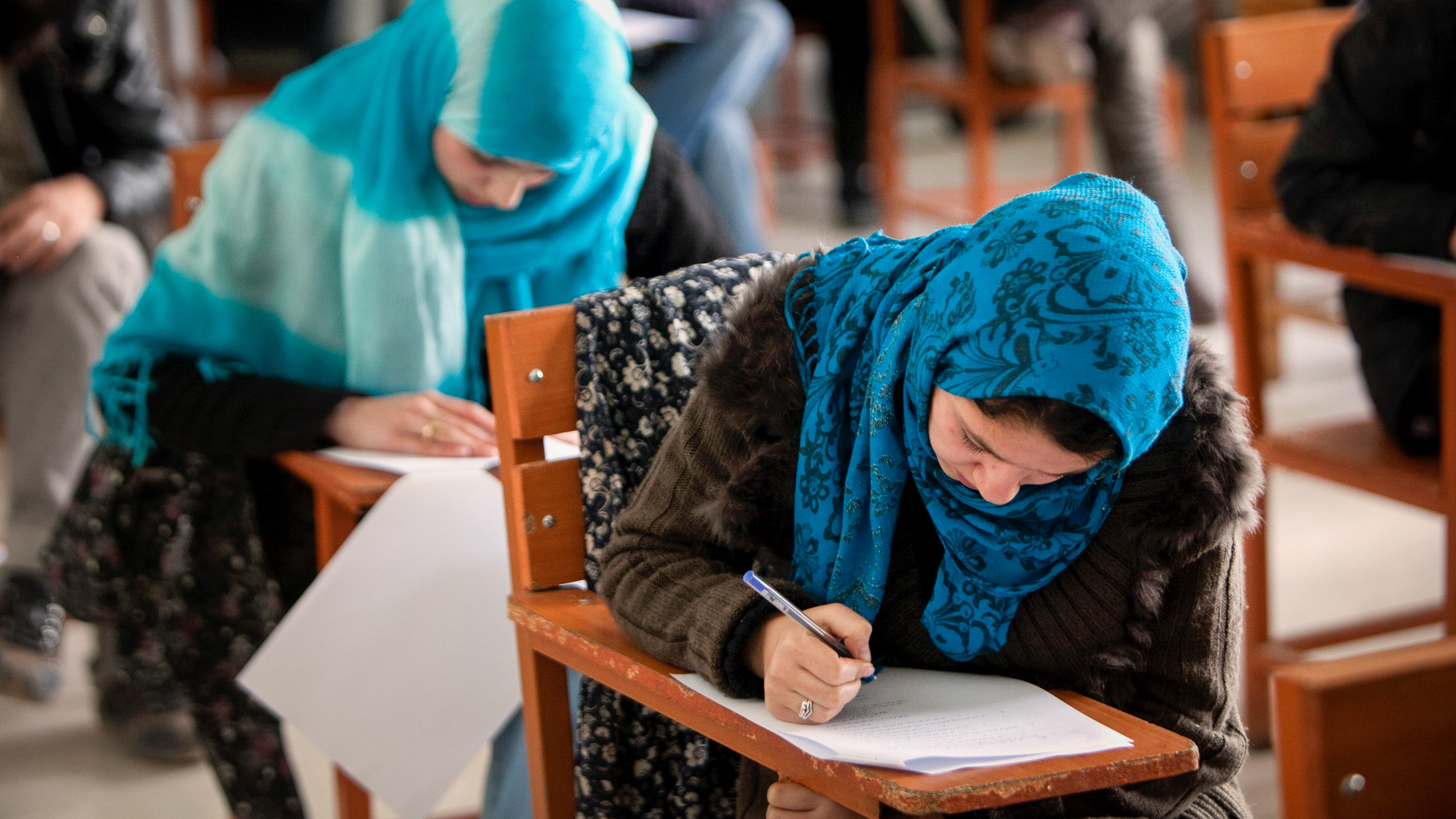 In December, the Taliban banned female students from attending university. Some of them are turning to online options. Above: Afghan female students attend Kabul University in 2010.