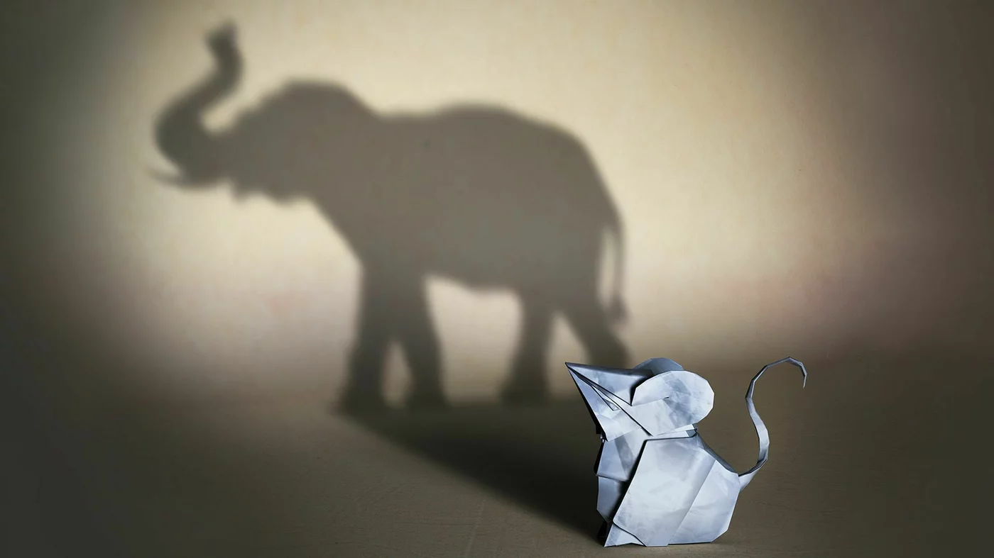 Illustration of mouse casting an elephant shadow