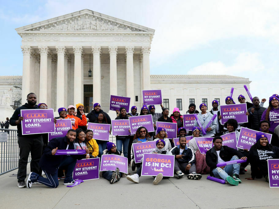 Student loan borrowers and advocates gather Tuesday for a rally during the Supreme Court's arguments on President Biden's student debt relief plan. (Getty Images for People's Rally)