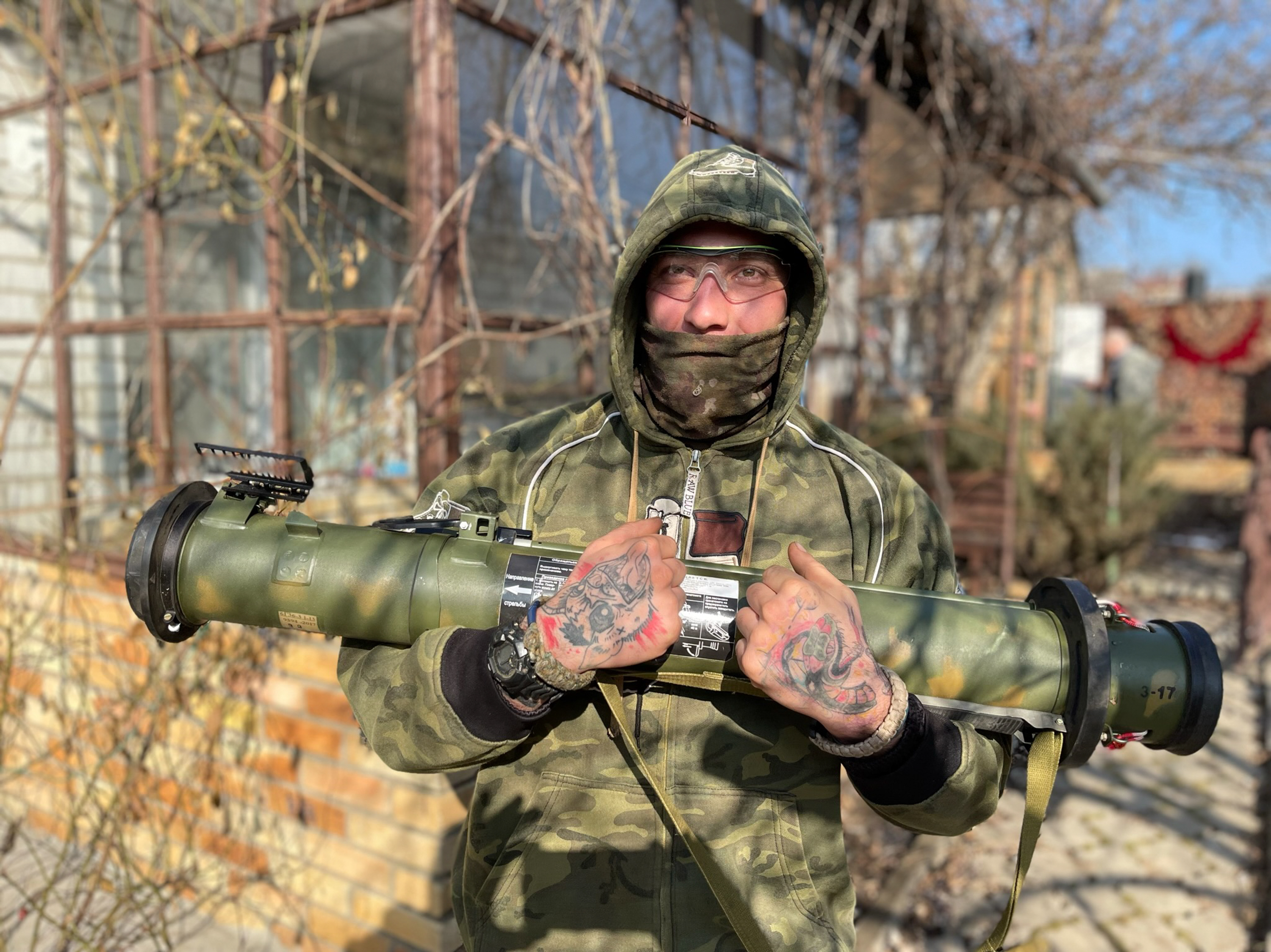 Ukrainian soldiers burn Russian flag as they reclaim territory