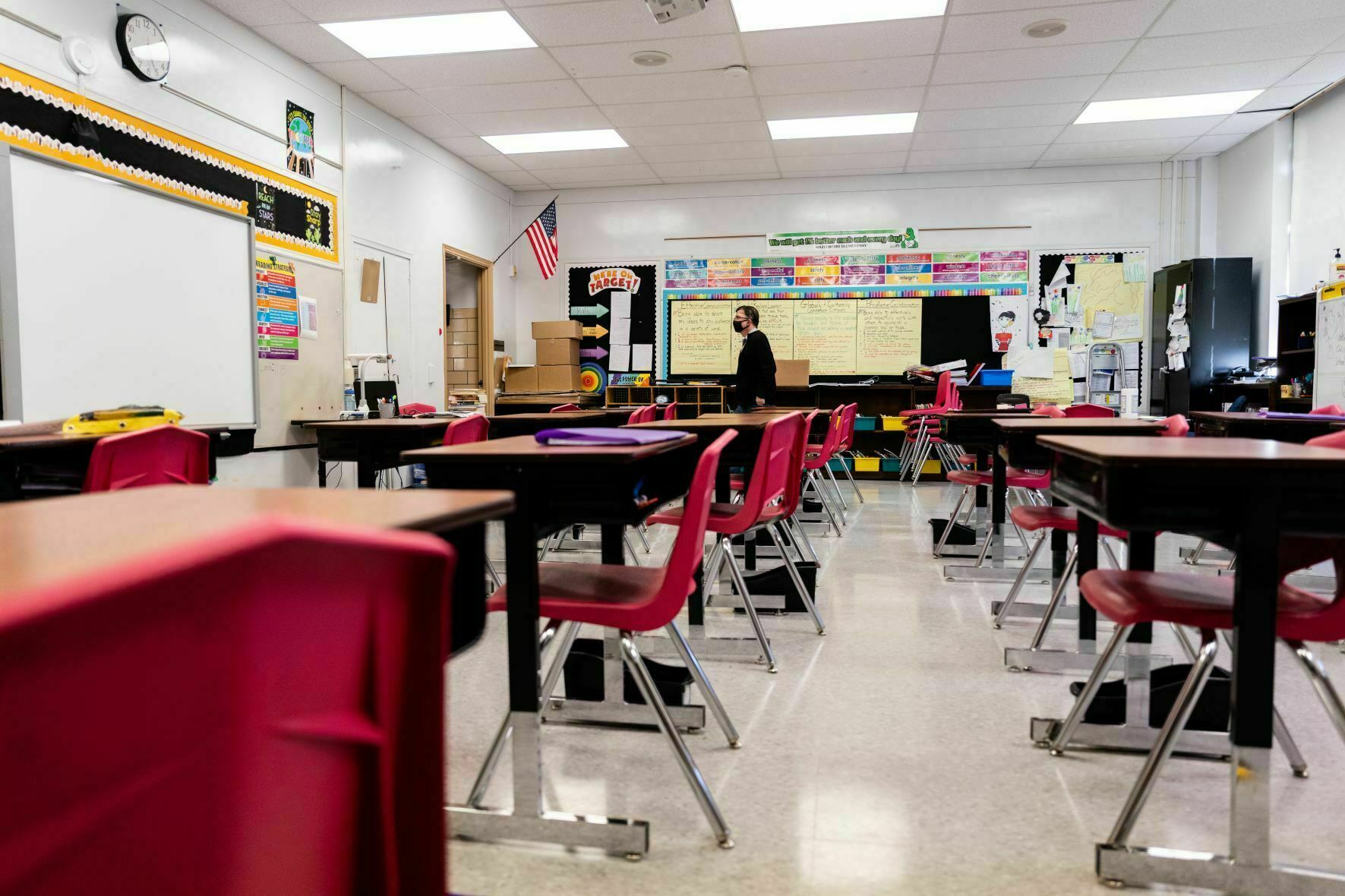 A Louisville, Ky., classroom sits empty in January 2022, during a COVID surge driven by the omicron variant. Students lost the routine of going to school during the pandemic, and now many are struggling to get back in the habit. (Getty Images)