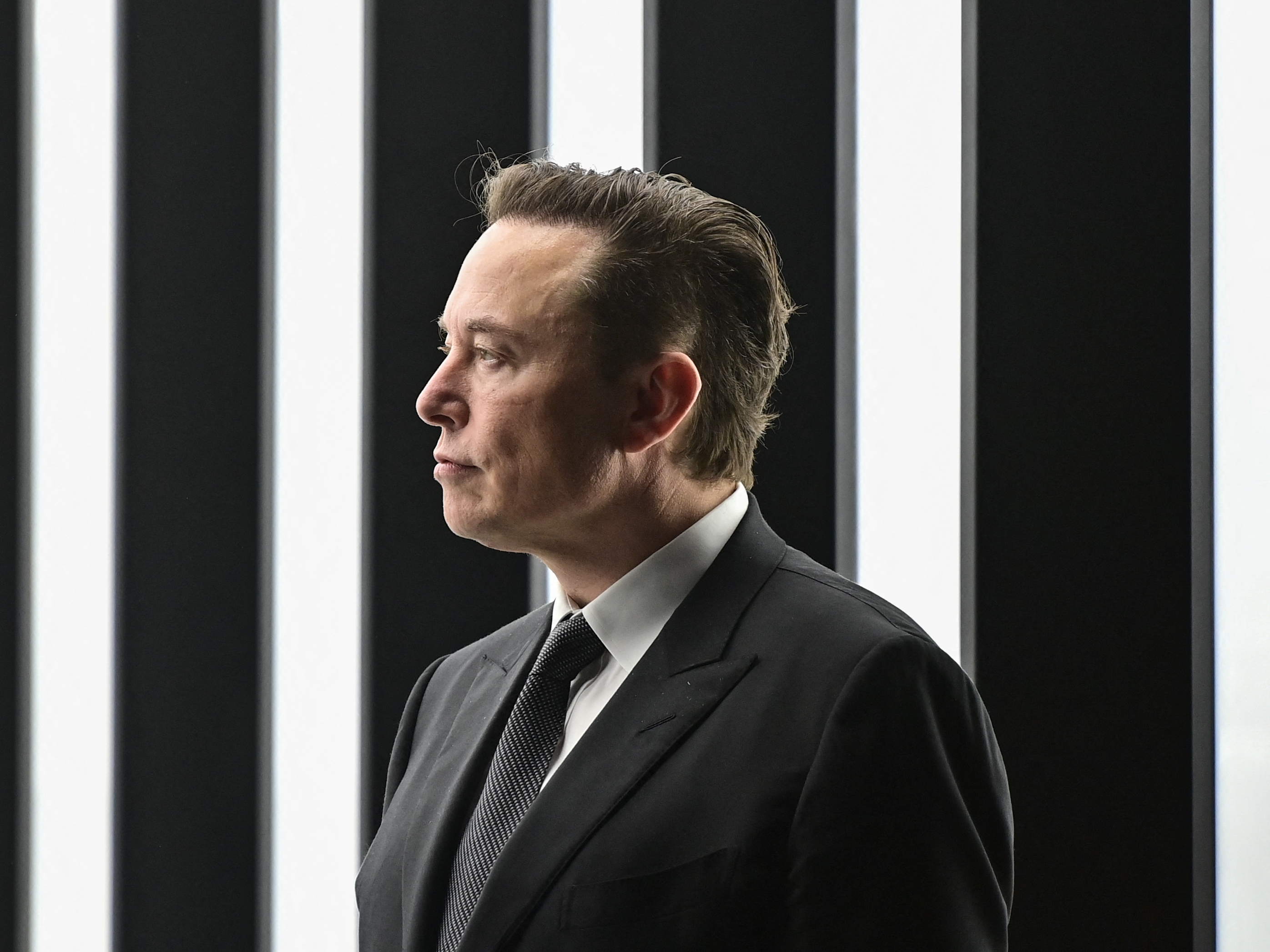 Tesla CEO Elon Musk is pictured as he attends the start of production at Tesla's &quot;Gigafactory&quot; in Gruenheide, southeast of Berlin in Germany. on March 22, 2022. Tesla held an investor day on Wednesday. It did not reveal a new vehicle, but it unveiled some of its big-picture ideas on climate change. (POOL/AFP via Getty Images)