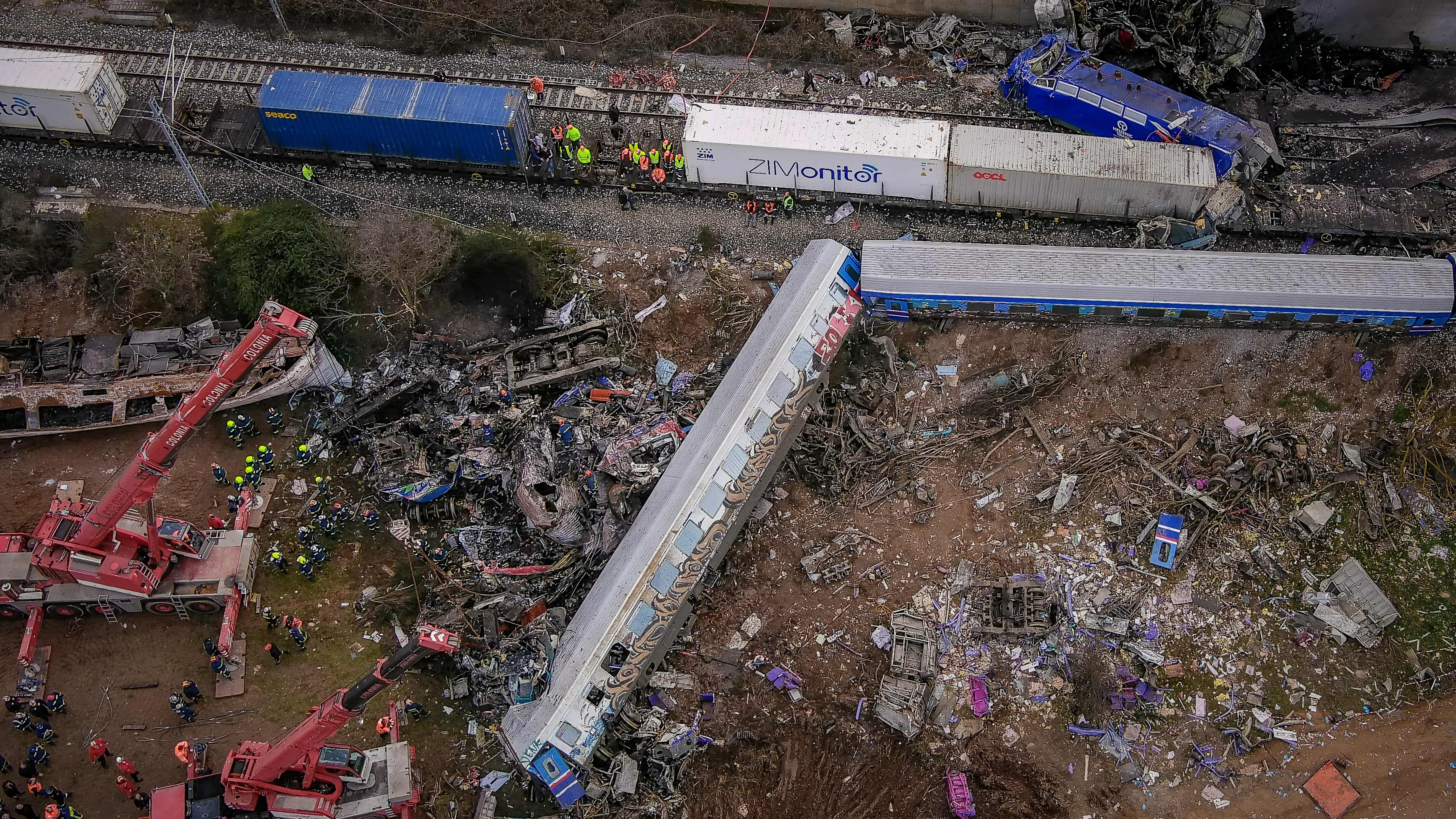Emergency crews continue to search through the wreckage after a train accident in the Tempe Valley near Larissa, Greece on Tuesday evening. At least 32 people were killed.