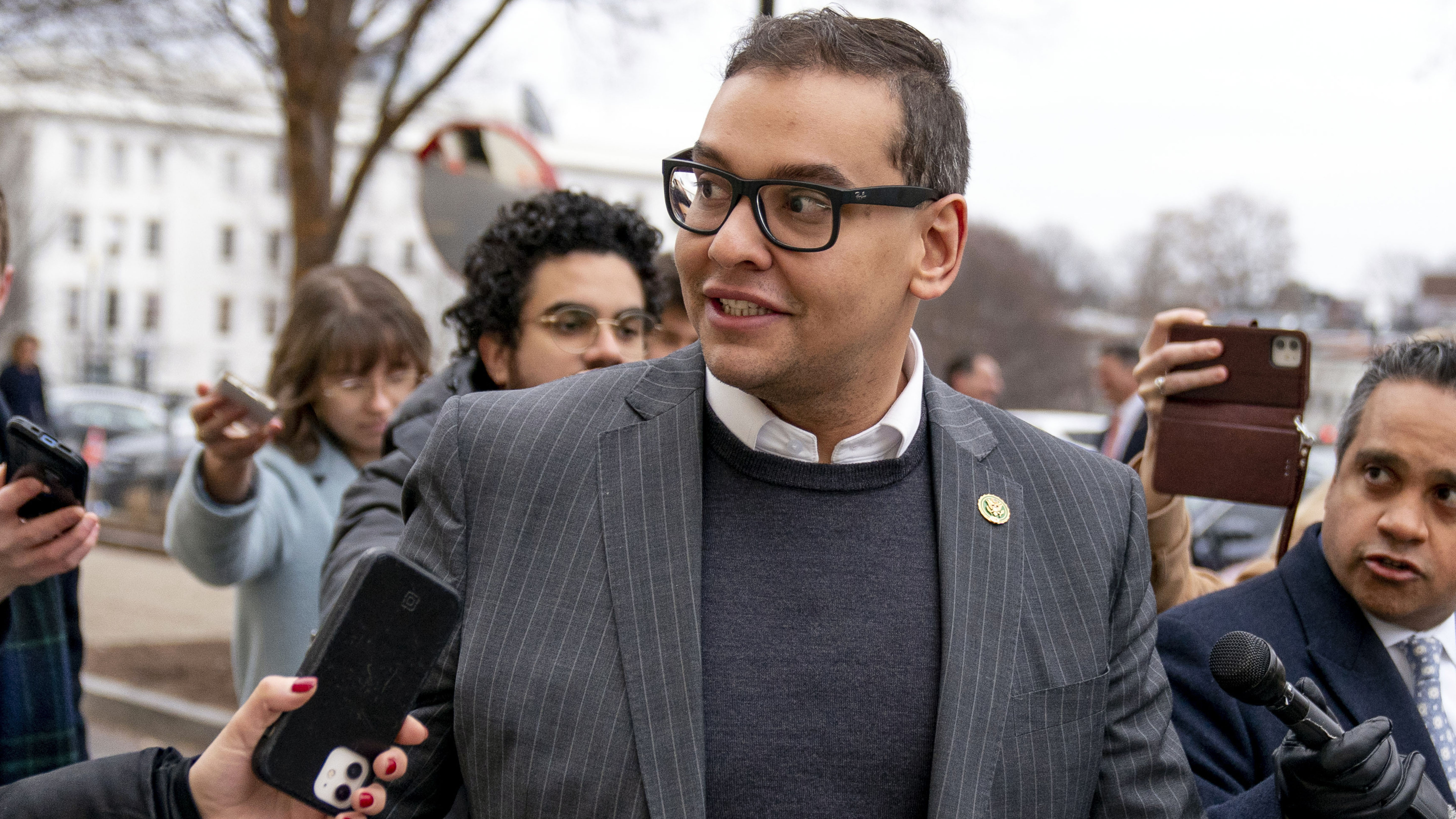 Rep. George Santos, R-N.Y., leaves a House GOP conference meeting on Capitol Hill on Jan. 25, 2023.