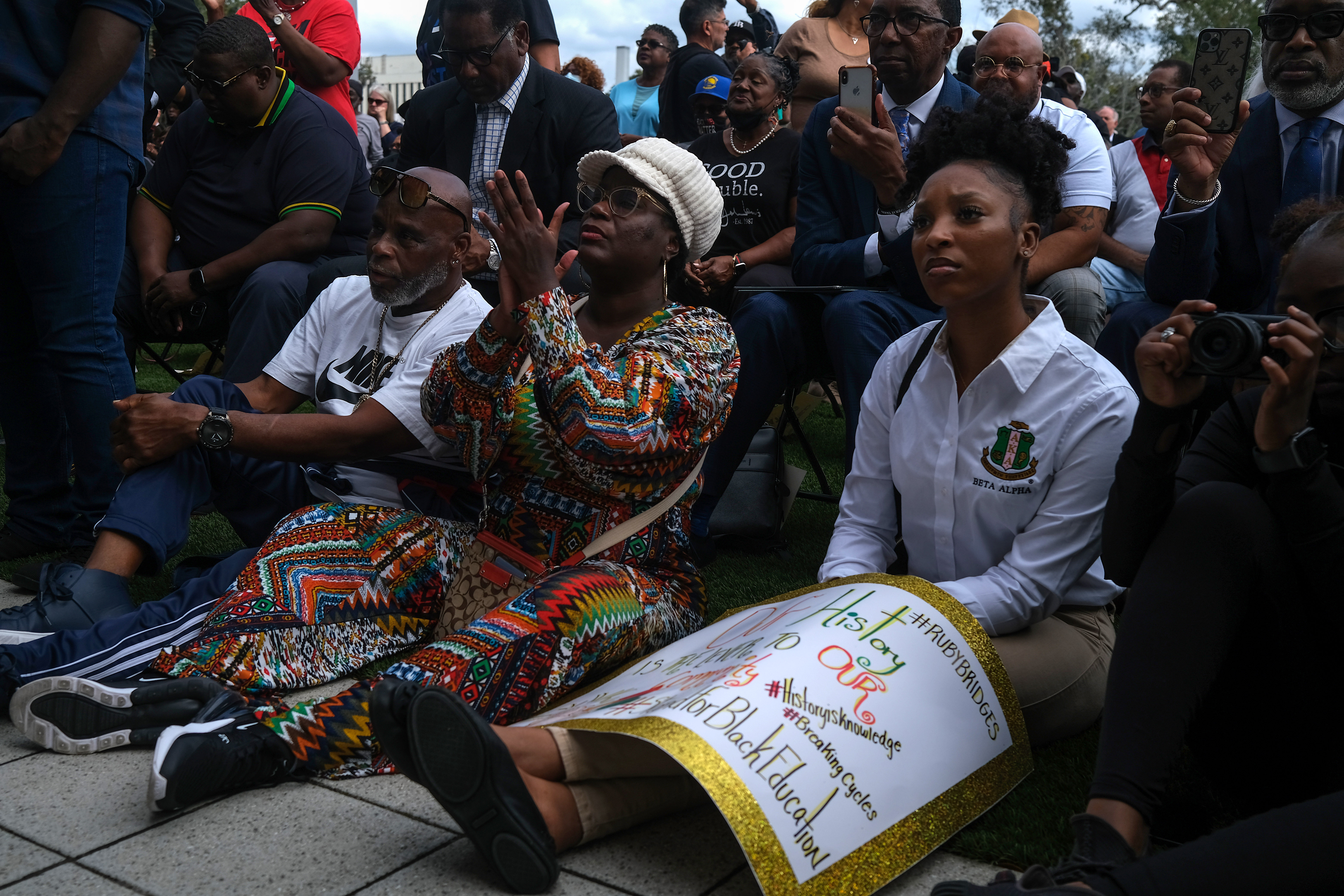 Demonstrators protest Florida Governor Ron DeSantis plan to eliminate Advanced Placement courses on African American studies in high schools as they stand outside the Florida State Capitol on February 15, 2023 in Tallahassee, Florida. (Joshua Lott/The Washington Post via Getty Images)