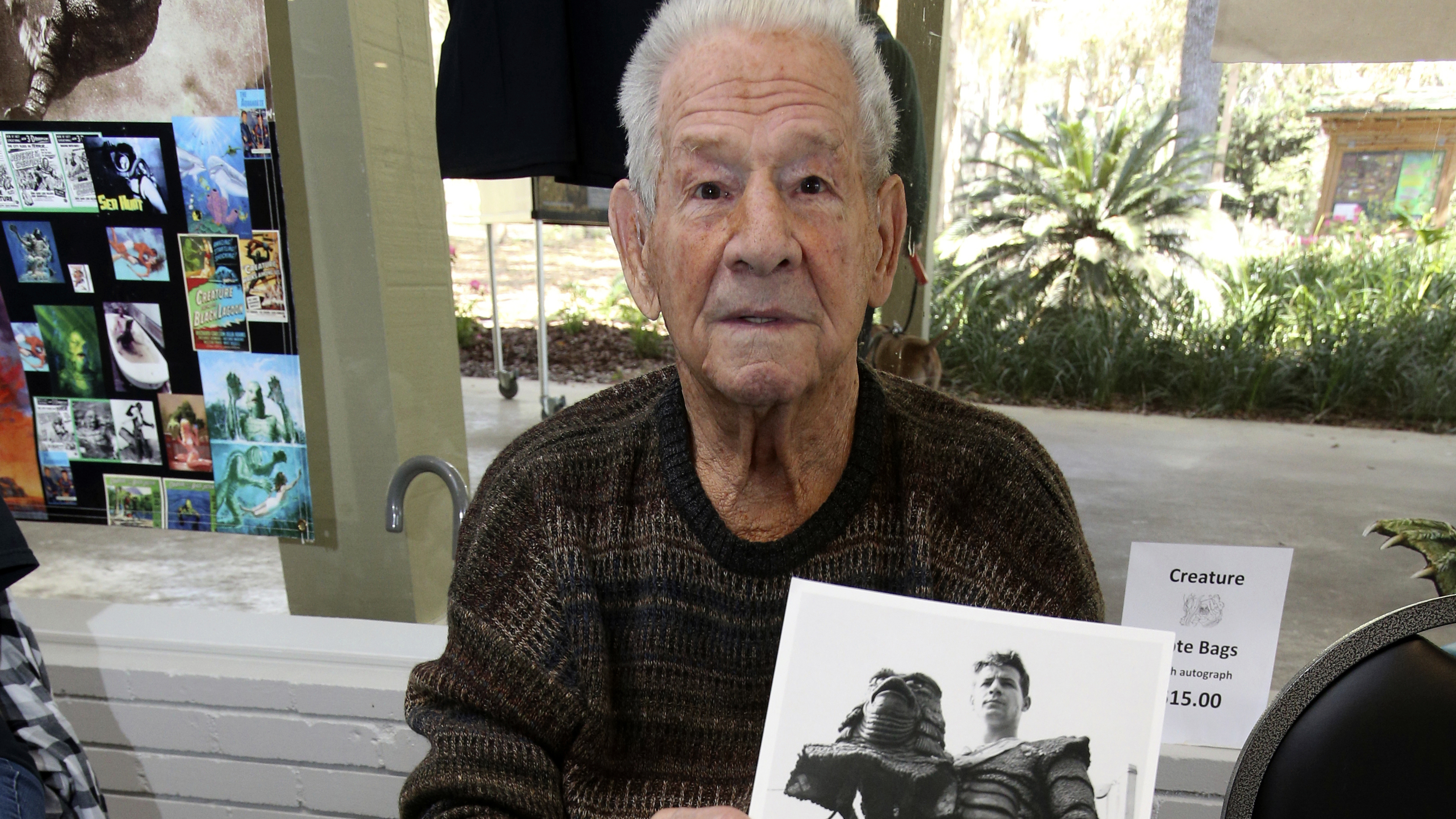 Ricou Browning, who played the creature in Creature from the Black Lagoon, poses for photos for people during Florida SpringsFest at Silver Springs State Park in Silver Springs, Fla., Sunday, March 4, 2018.