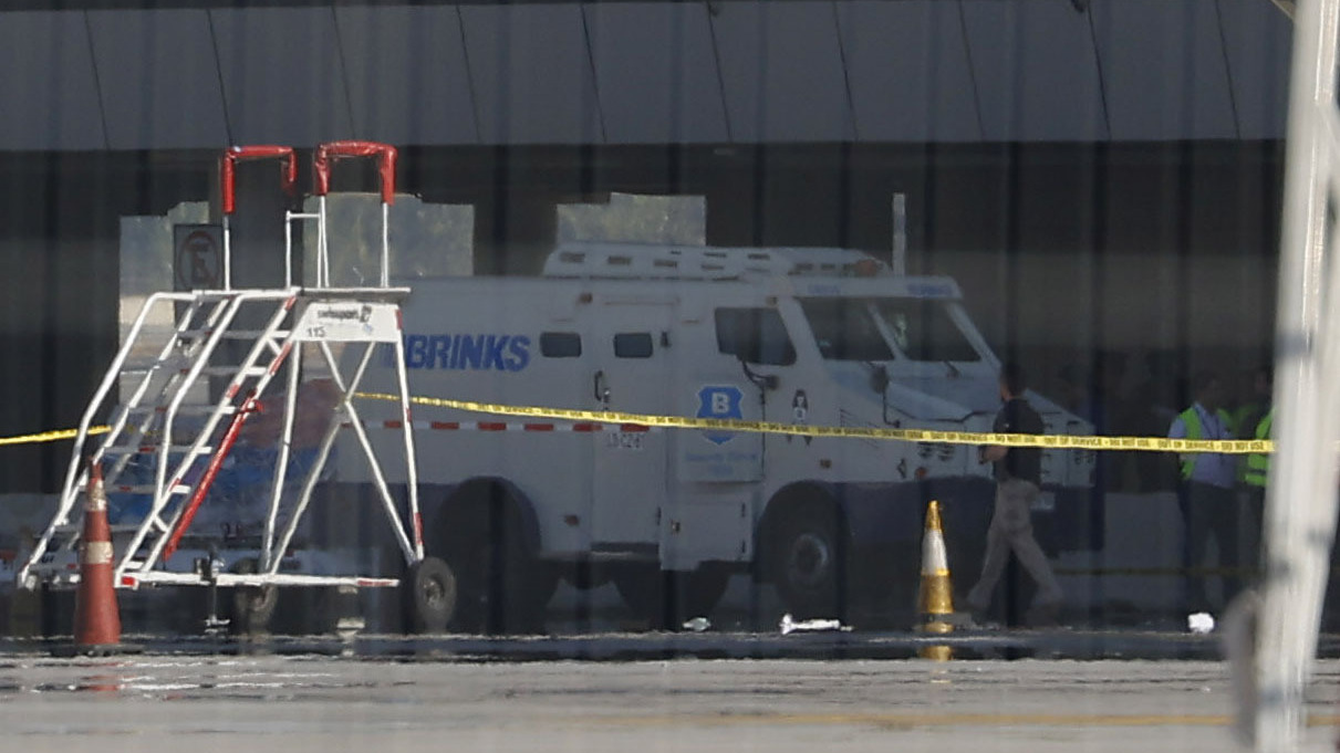 An attempted airport heist of $32 million in Chile leaves 2 people dead