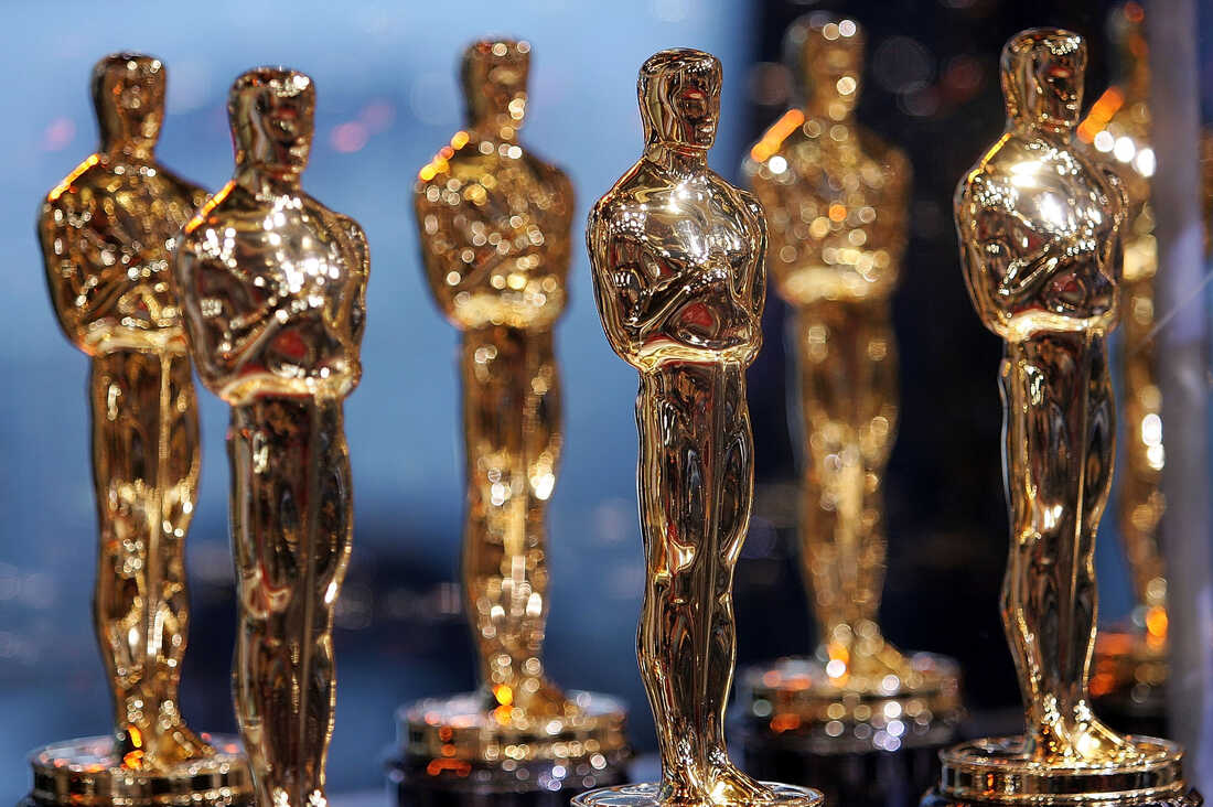 Oscar statuettes are displayed at 