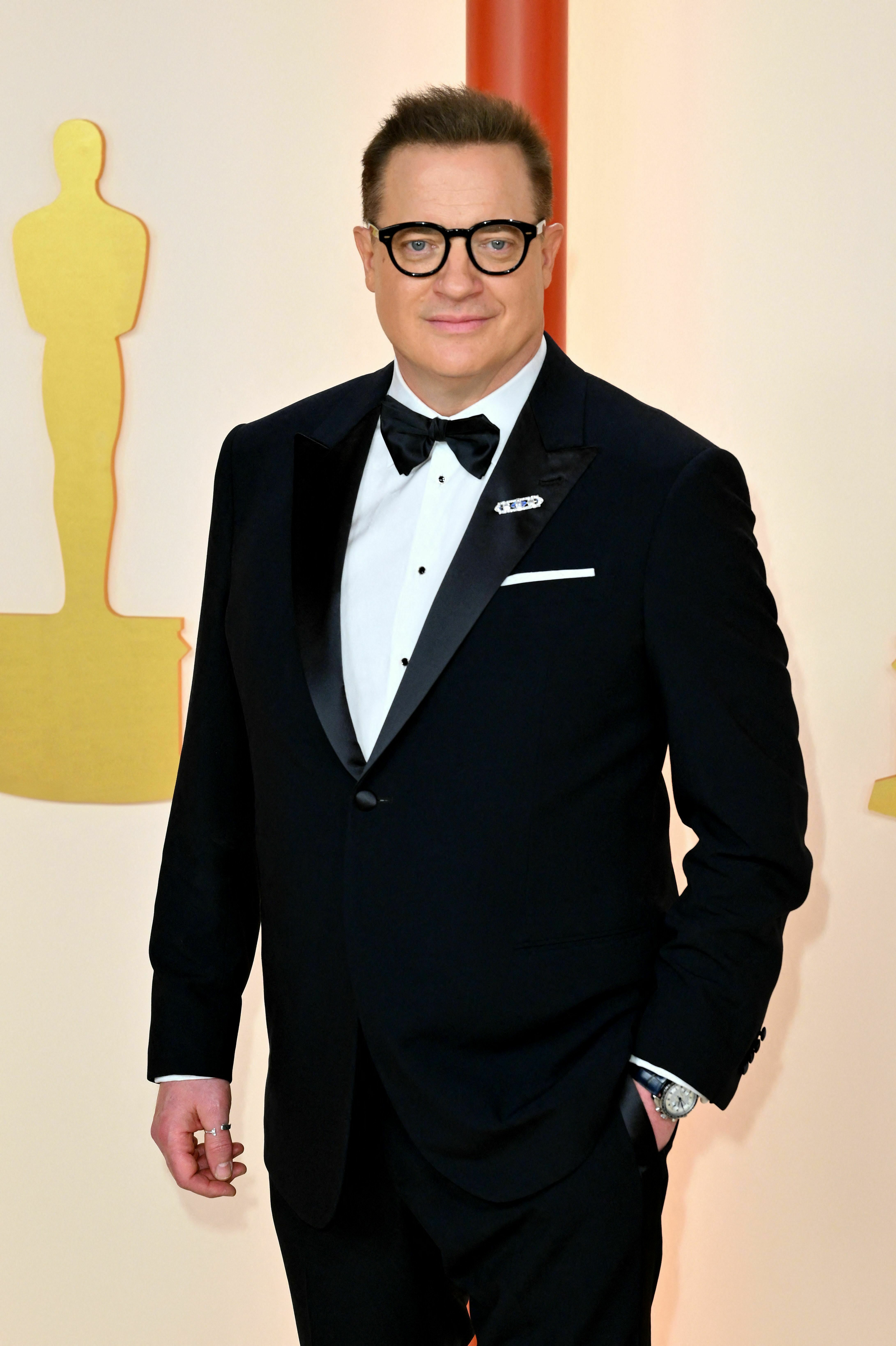 See all the red carpet looks from the 2023 Oscars 12 Brendan Fraser