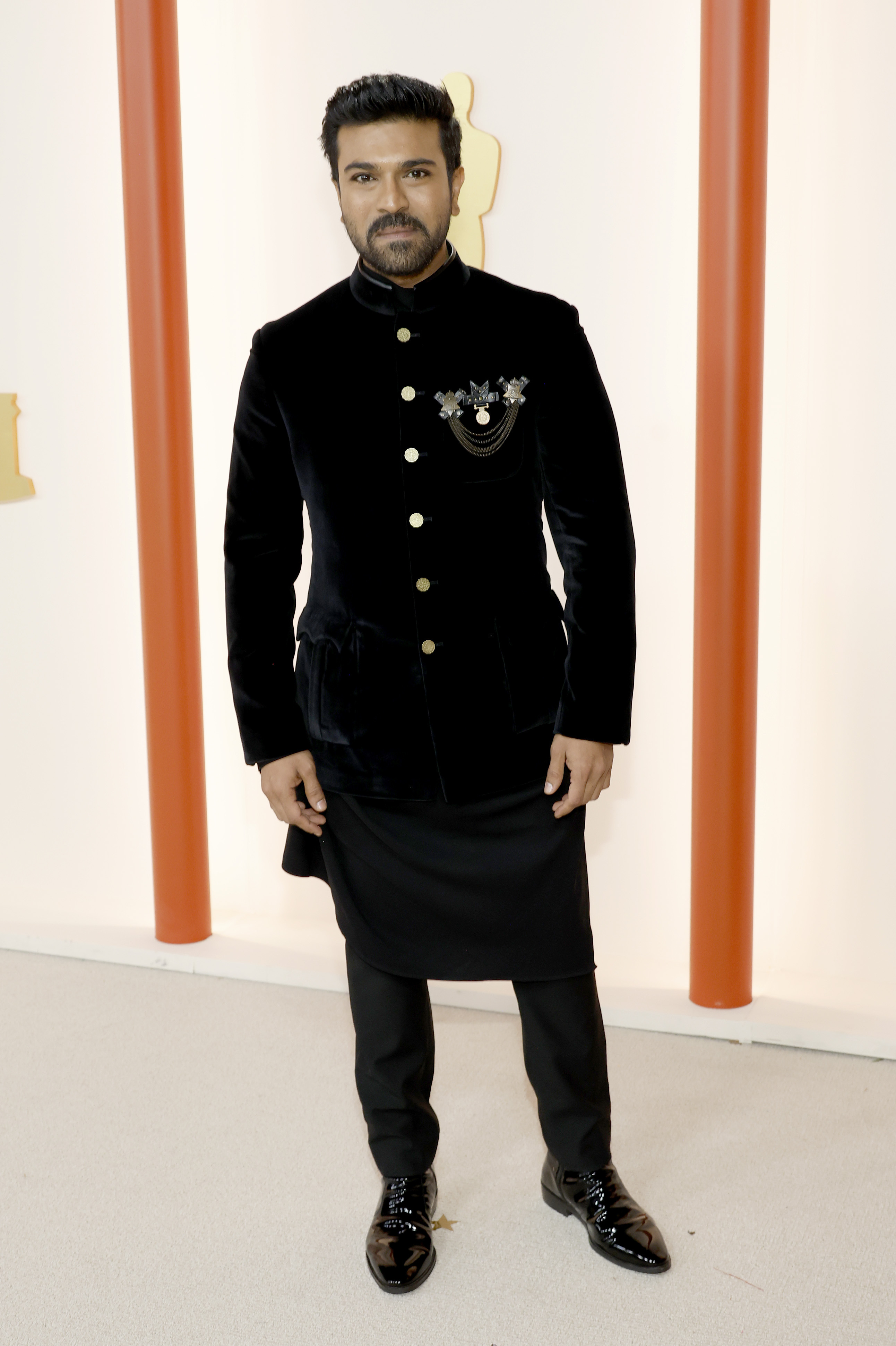 See all the red carpet looks from the 2023 Oscars 22 Ram Charan