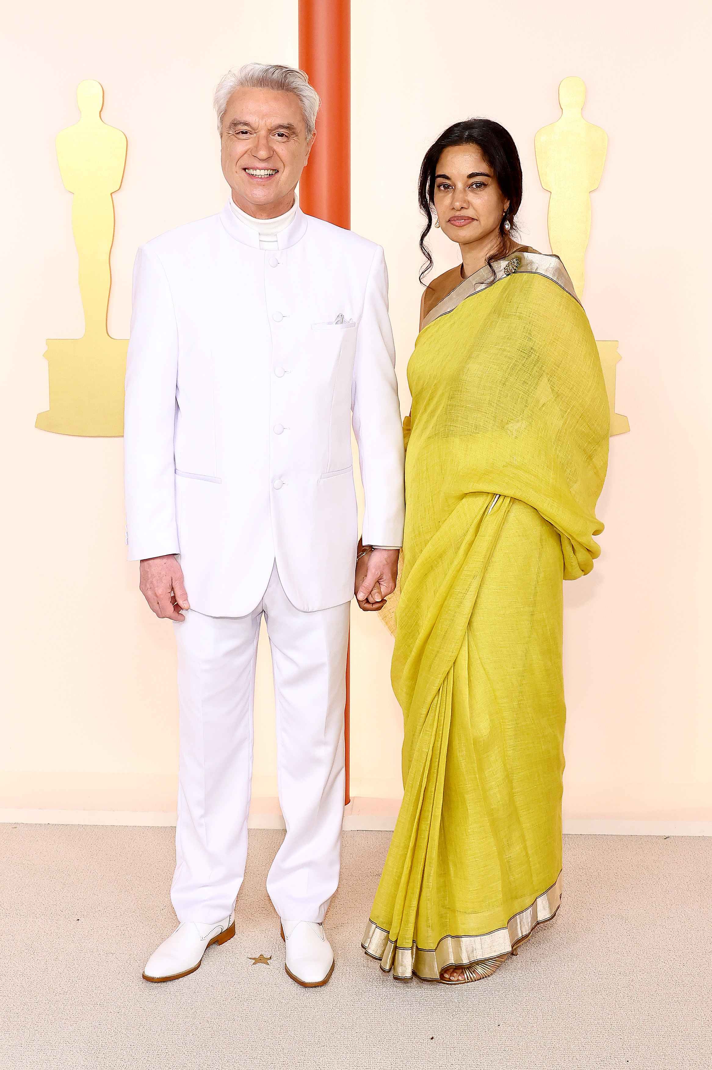 See all the red carpet looks from the 2023 Oscars 29 David Byrne and Mala Gaonkar