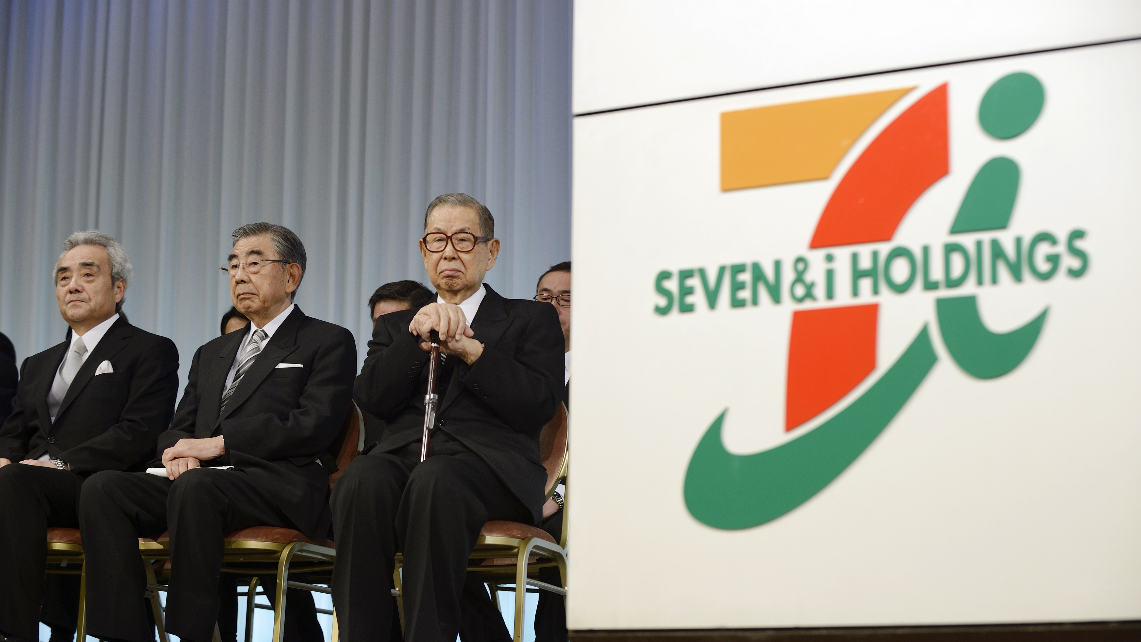 Seven & I Holdings Co. founder and honorary chairman Masatoshi Ito, right, attends the company