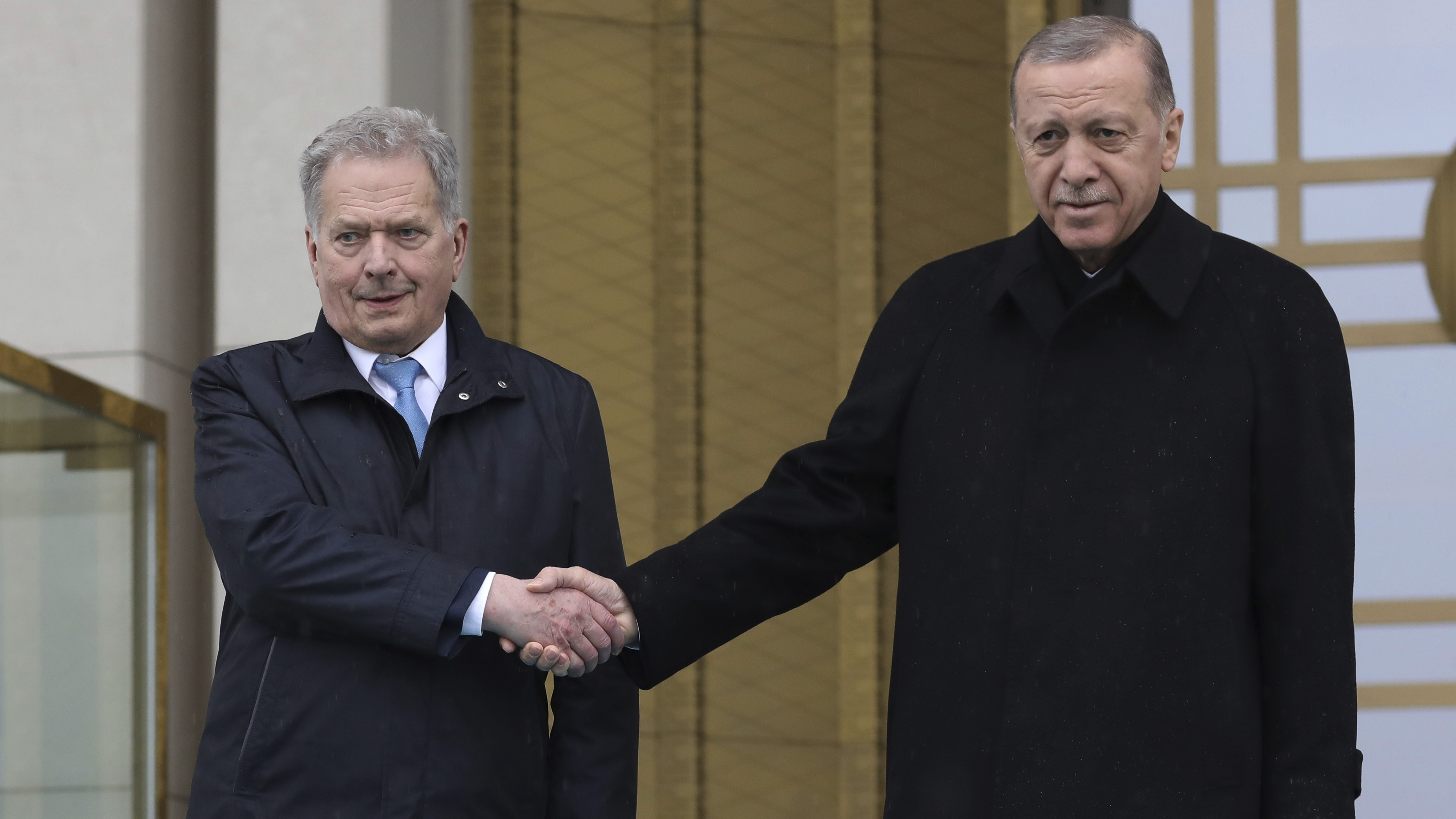 Turkish President Recep Tayyip Erdogan, right, and Finland