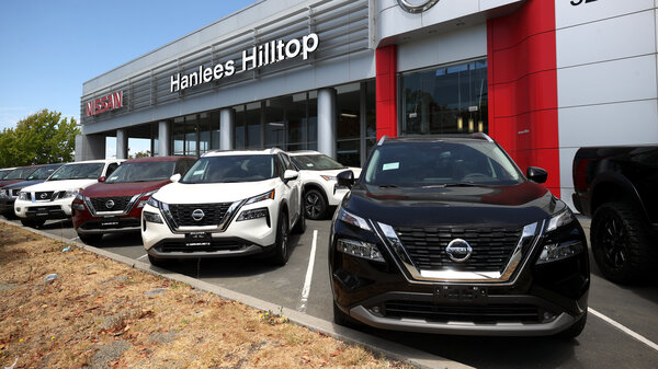 Brand-new Nissan vehicles sit on a sales lot in Richmond, Calif.