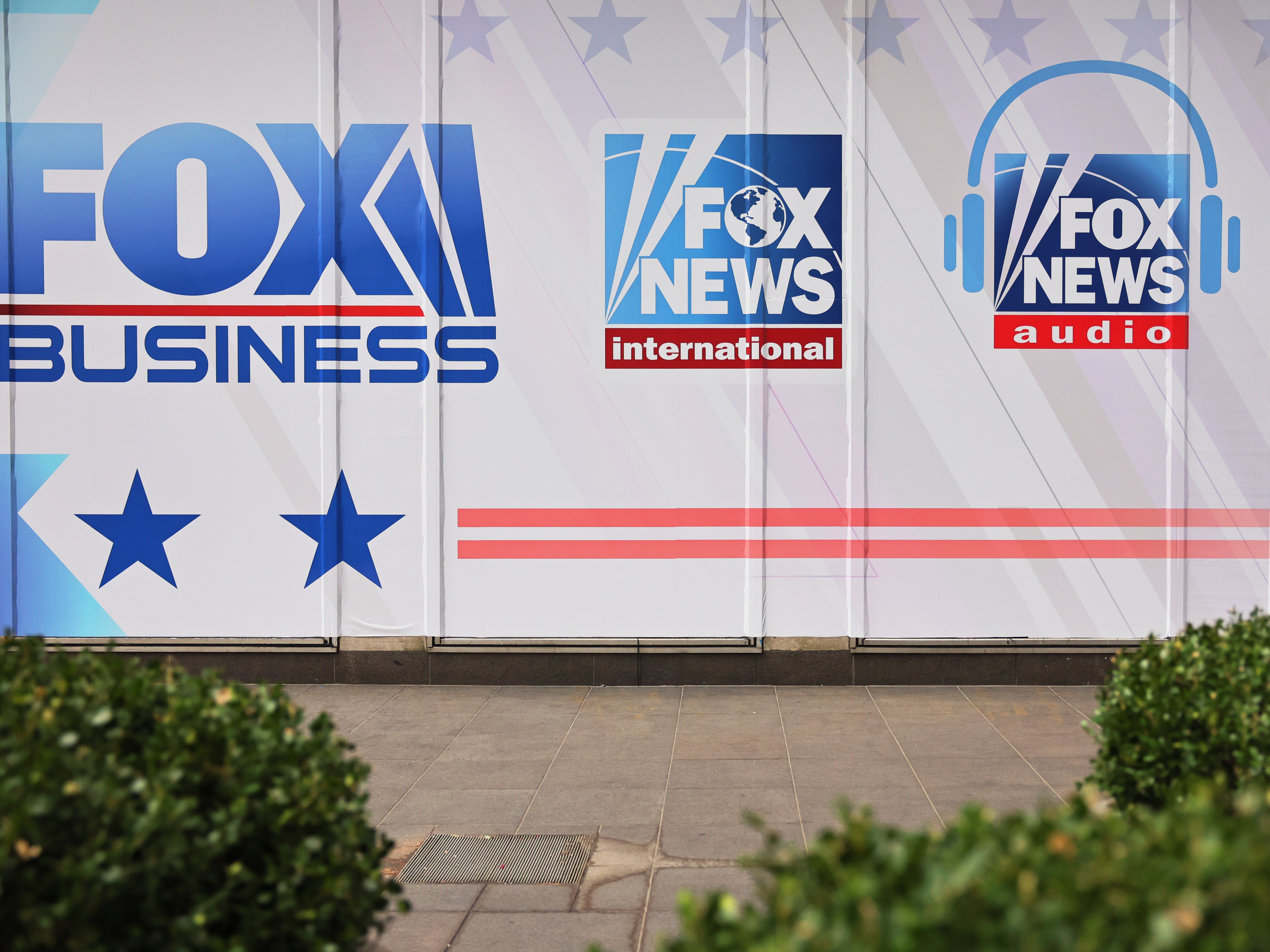 The logos for Fox programs are displayed on the News Corp. building on Jan. 25 in New York City. (Getty Images)