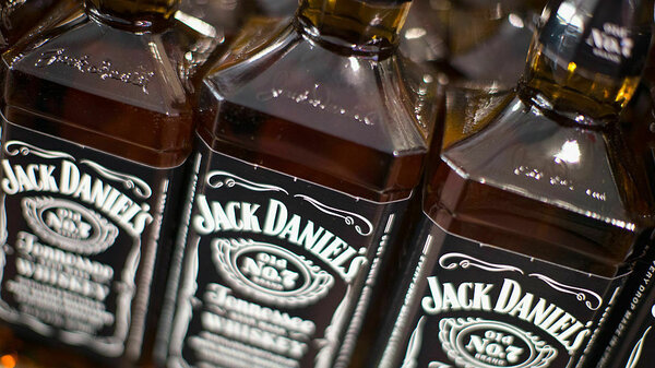 Several bottles of Jack Daniels whiskey.