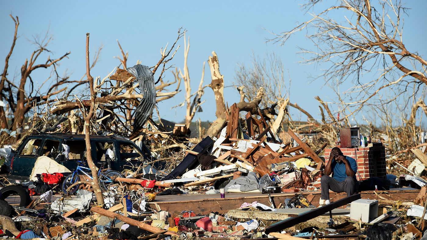 Mississippi and Alabama face a painful recovery after storms and a tornado killed 26