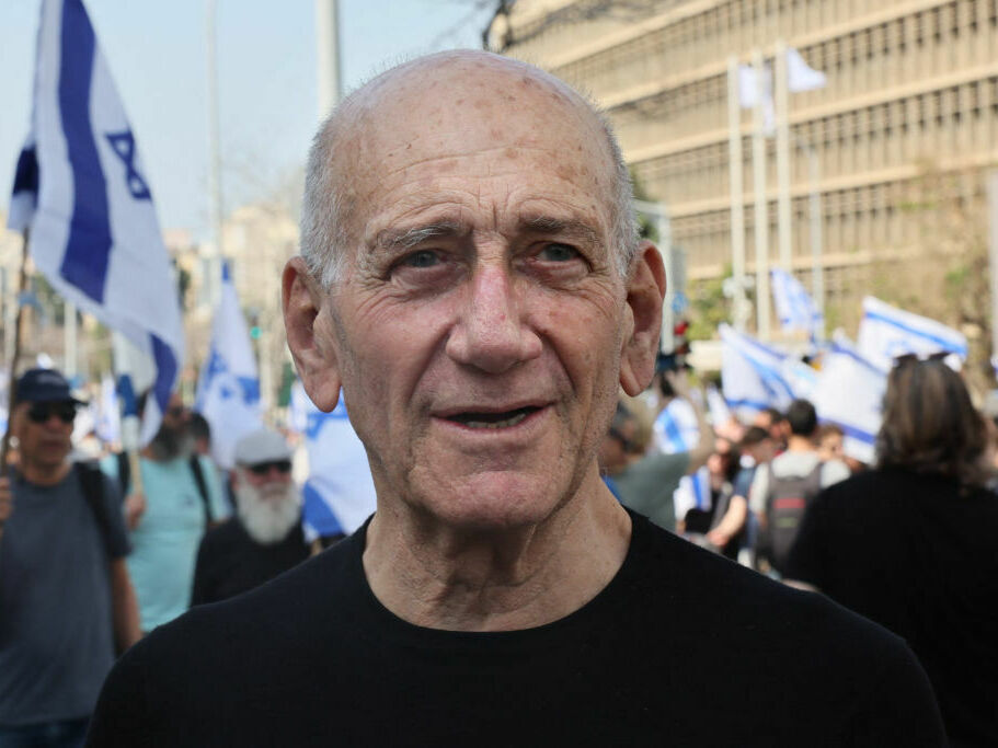 Former Israeli prime minister Ehud Olmert attends a demonstration against the Israeli government's controversial judicial overhaul bill in Tel Aviv on March 1. (AFP via Getty Images)