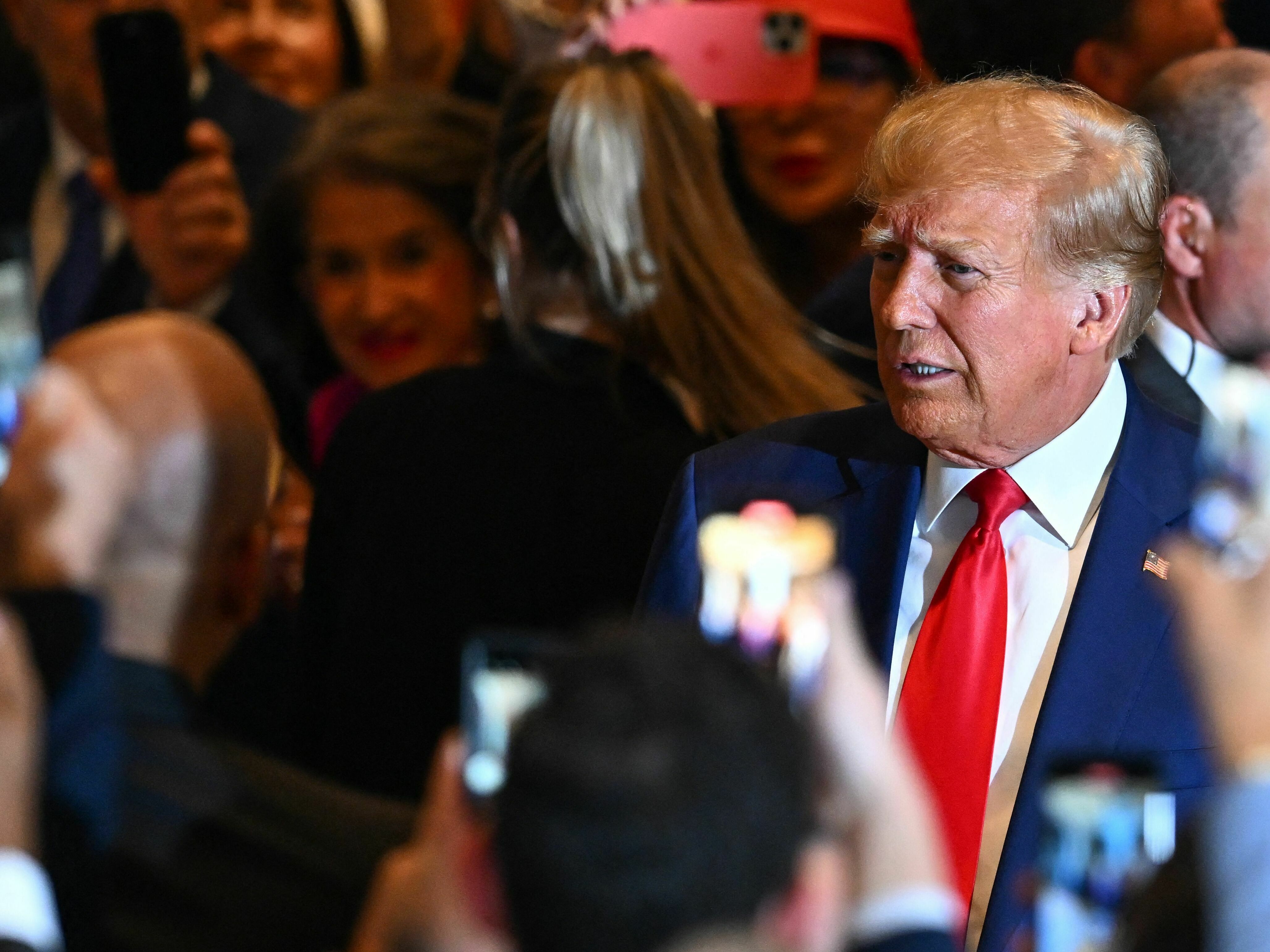 Former President Donald Trump arrives to speak at his Mar-a-Lago estate in Palm Beach, Fla., on Tuesday night, following his arraignment in New York on felony charges. (AFP via Getty Images)