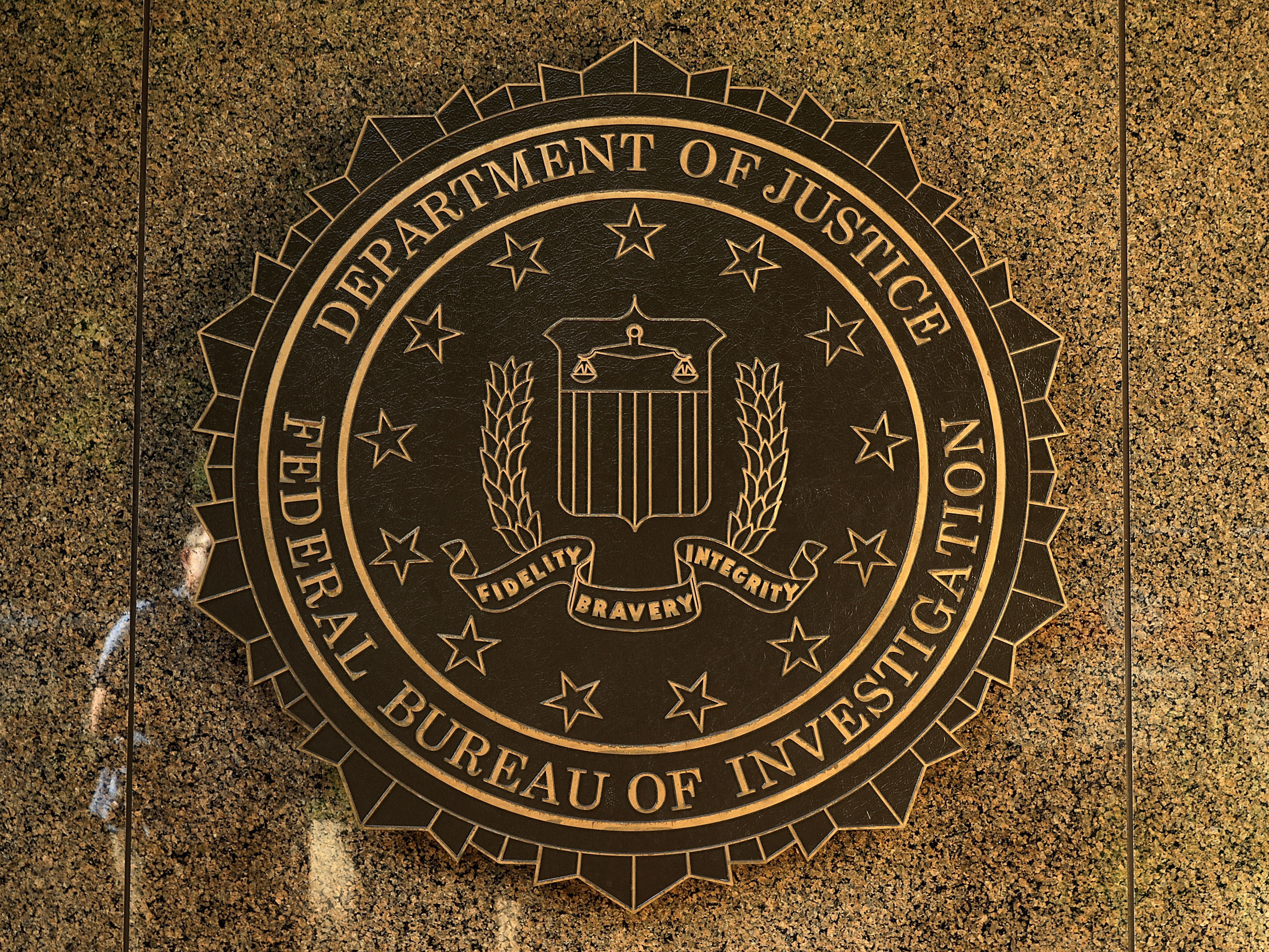 The seal of the Federal Bureau of Investigation hangs on the outside of the bureau's Edgar J. Hoover Building May 9, 2017 in Washington, DC. (Getty Images)