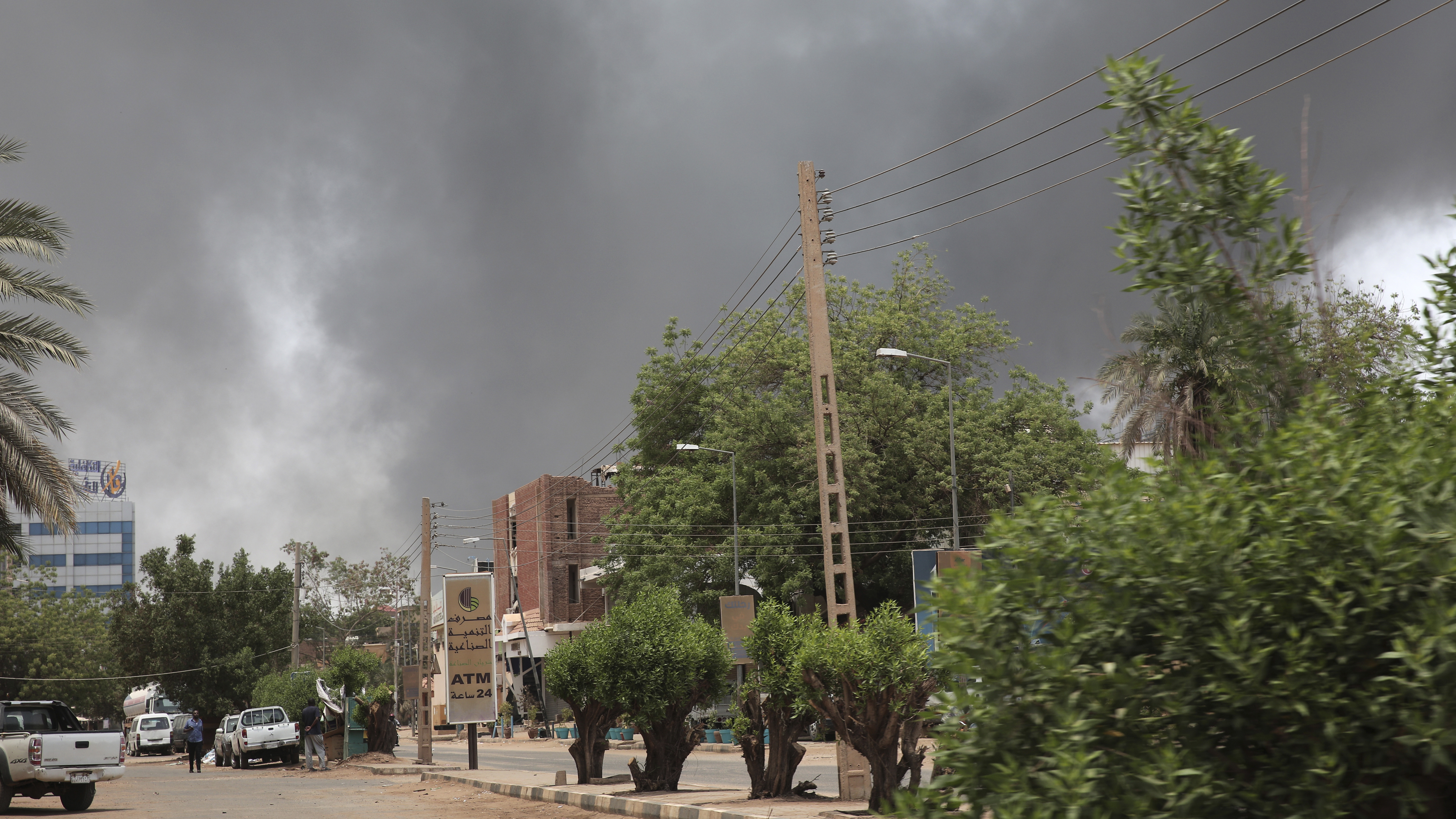 Smoke is seen rising from a neighborhood in Khartoum, Sudan, on Saturday. Fierce clashes between Sudan