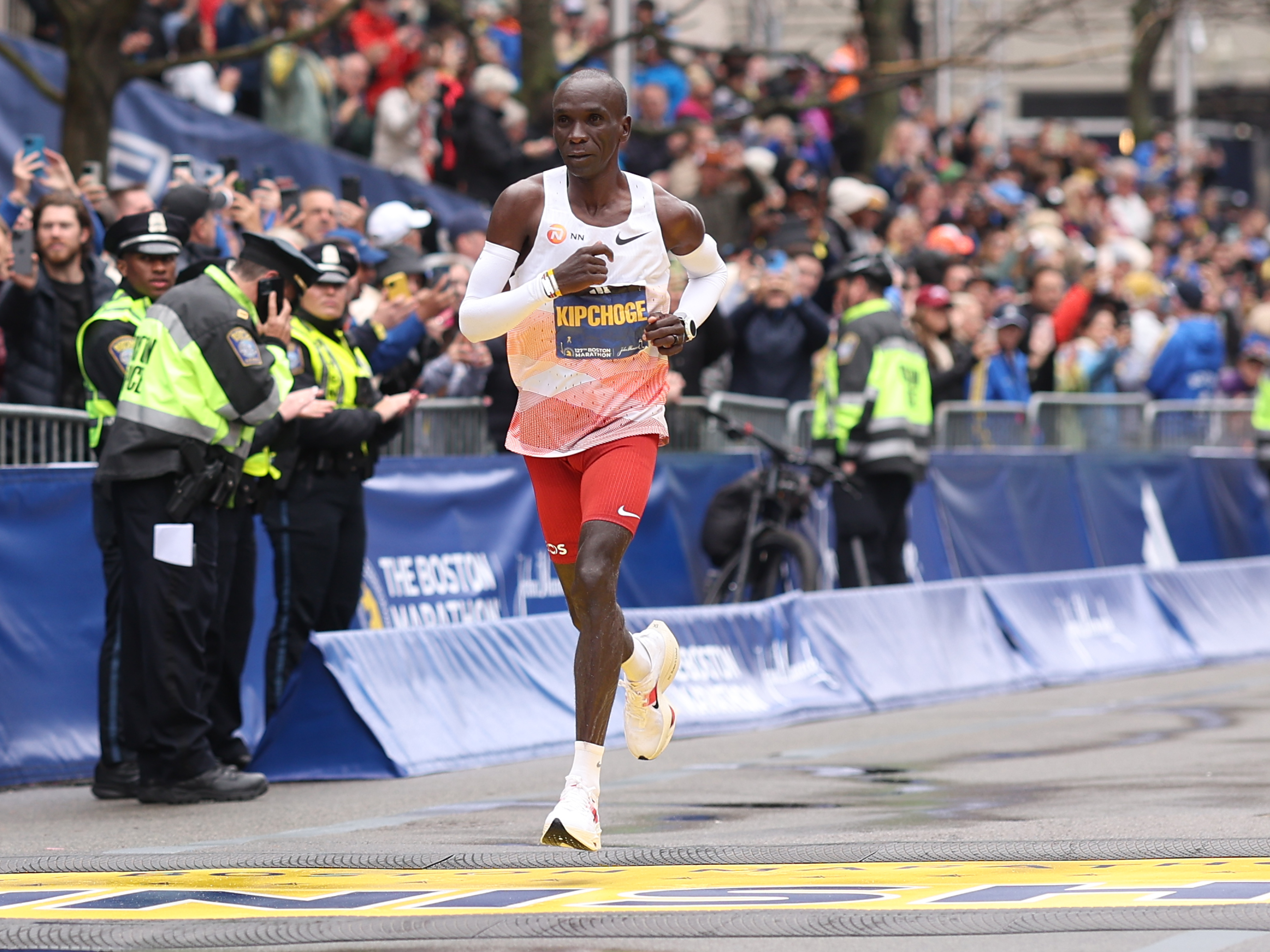 Eliud Kipchoge crosses the finish line and takes sixth place in the professional Men's Division during the 127th Boston Marathon. (Getty Images)