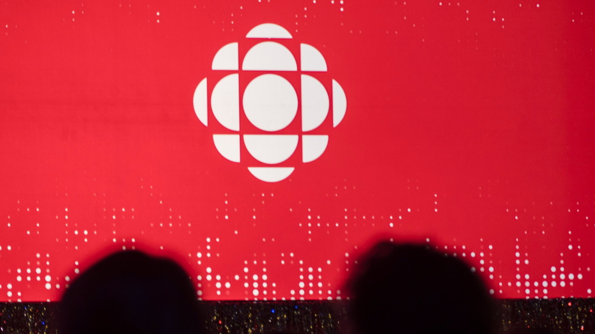 The Canadian Broadcasting Corporation logo is projected onto a screen on May 29, 2019, in Toronto.