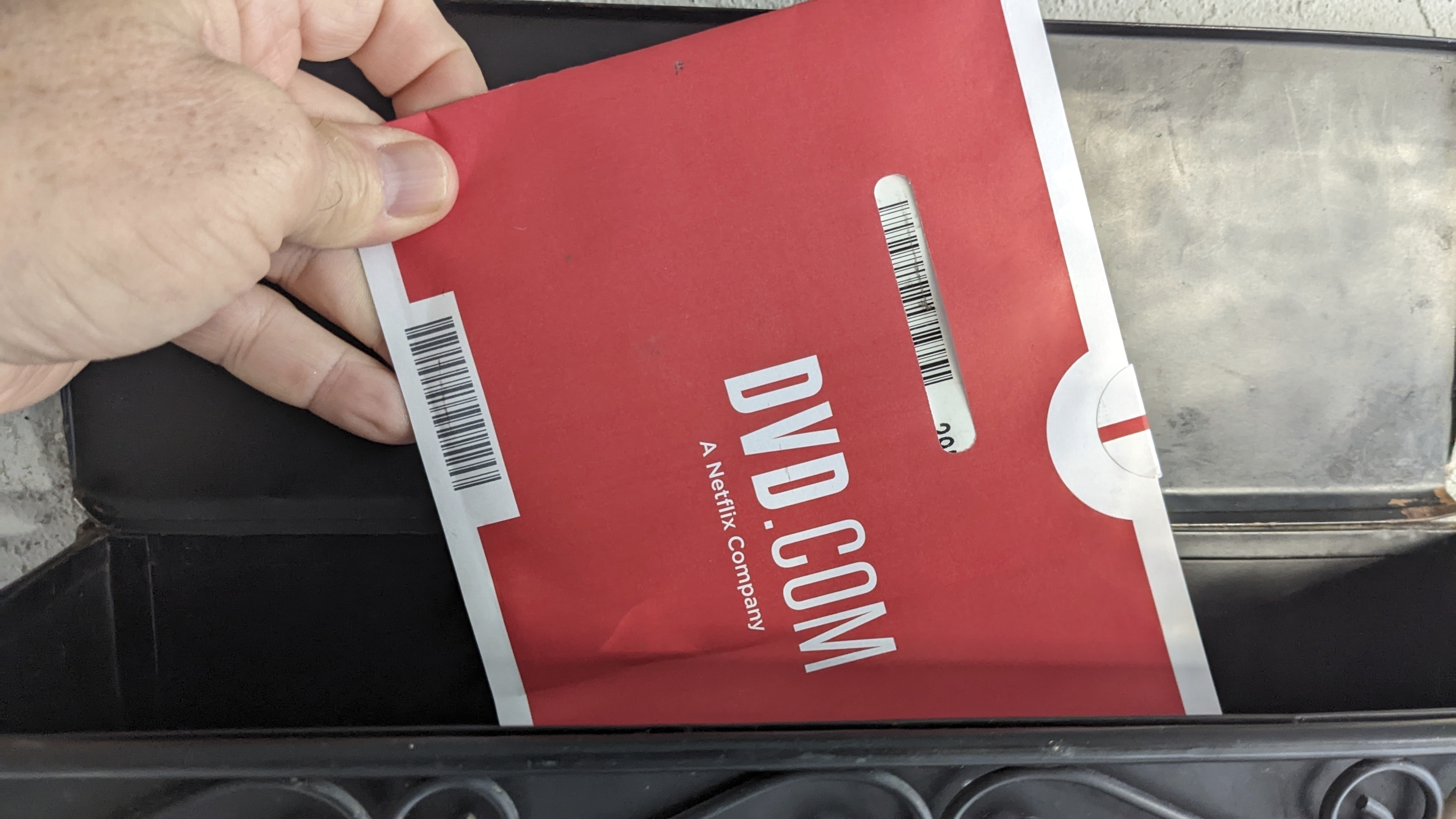A Netflix DVD envelope is shown in 2022 in San Francisco. Netflix is poised to shut down its DVD-by-mail rental service.