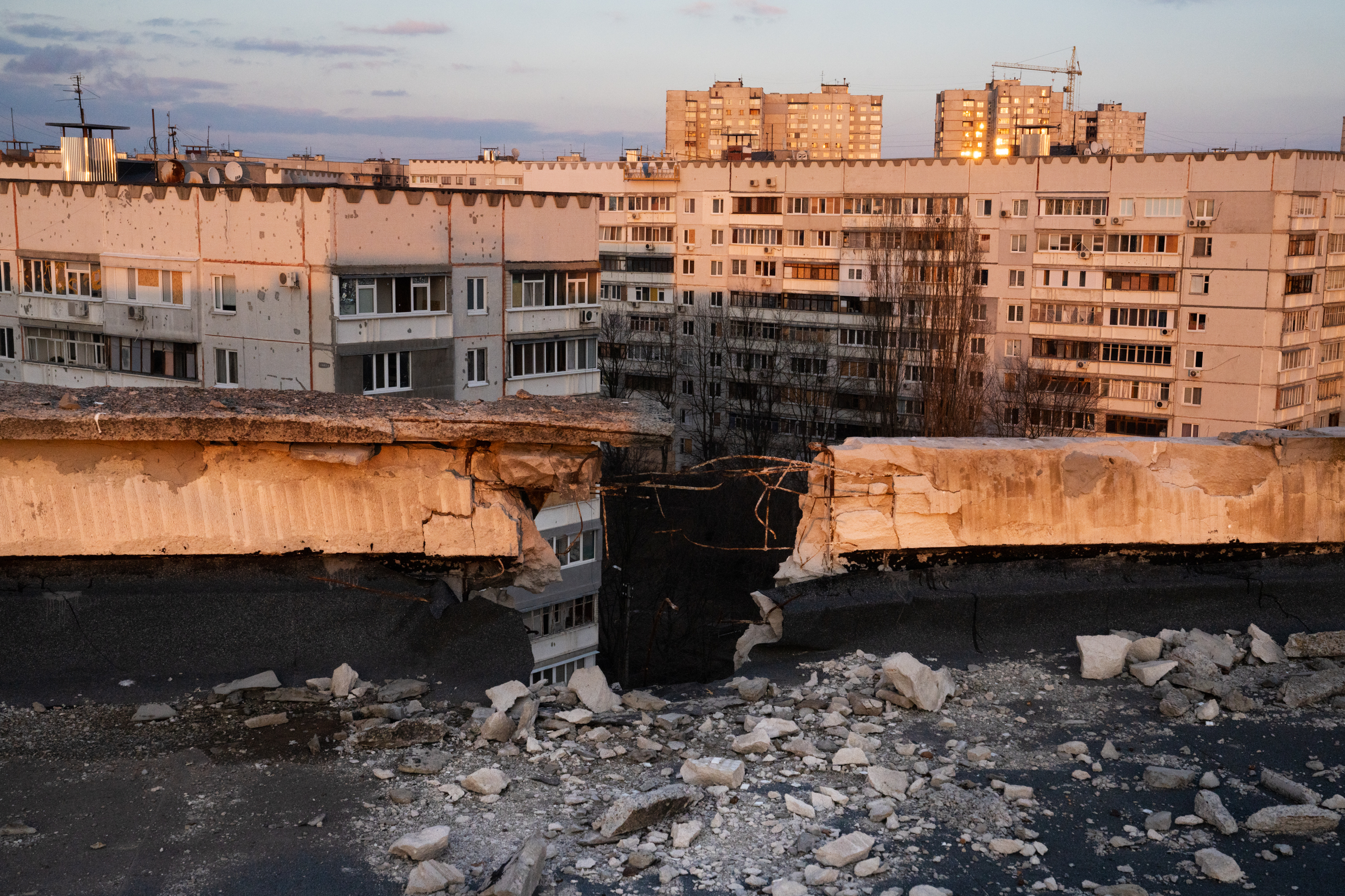 A high-rise building in Kharkiv's Saltivka district, once home to at least 400,000 people, is damaged from shelling during Russia's invasion of Ukraine. (NPR)