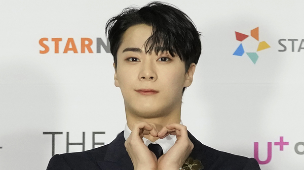 Moon Bin, a member of K-Pop group ASTRO, poses for photos on the red carpet for the 2021 Asia Artist Awards in Seoul, South Korea, Dec. 2, 2021.