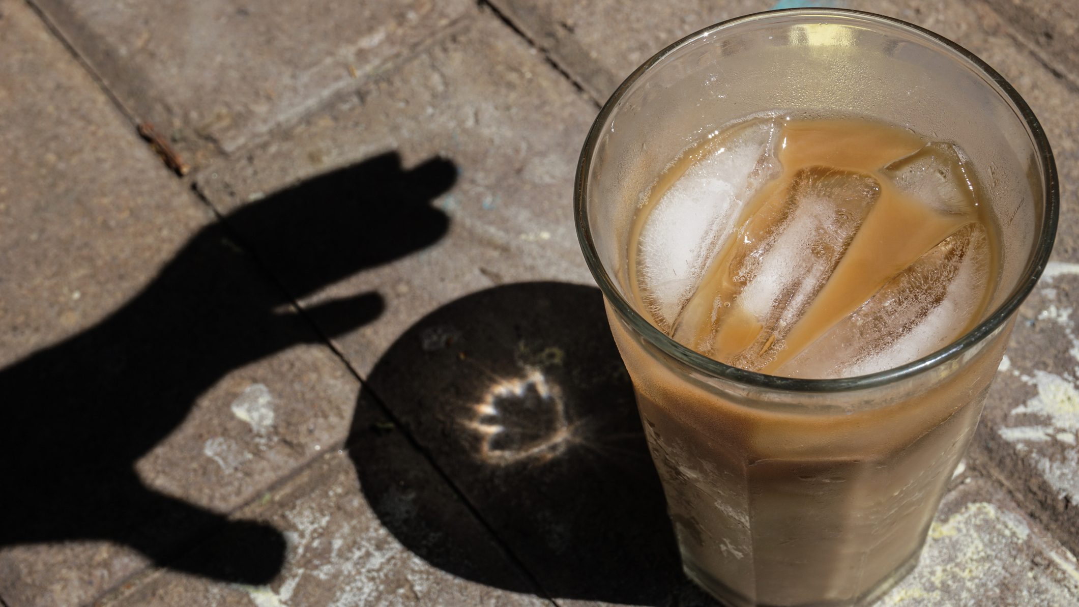 The seemingly simple act of reaching for a cup of coffee actually activates parts of the brain involved in motion, planning and emotions. (Melinda Podor / Getty Images)