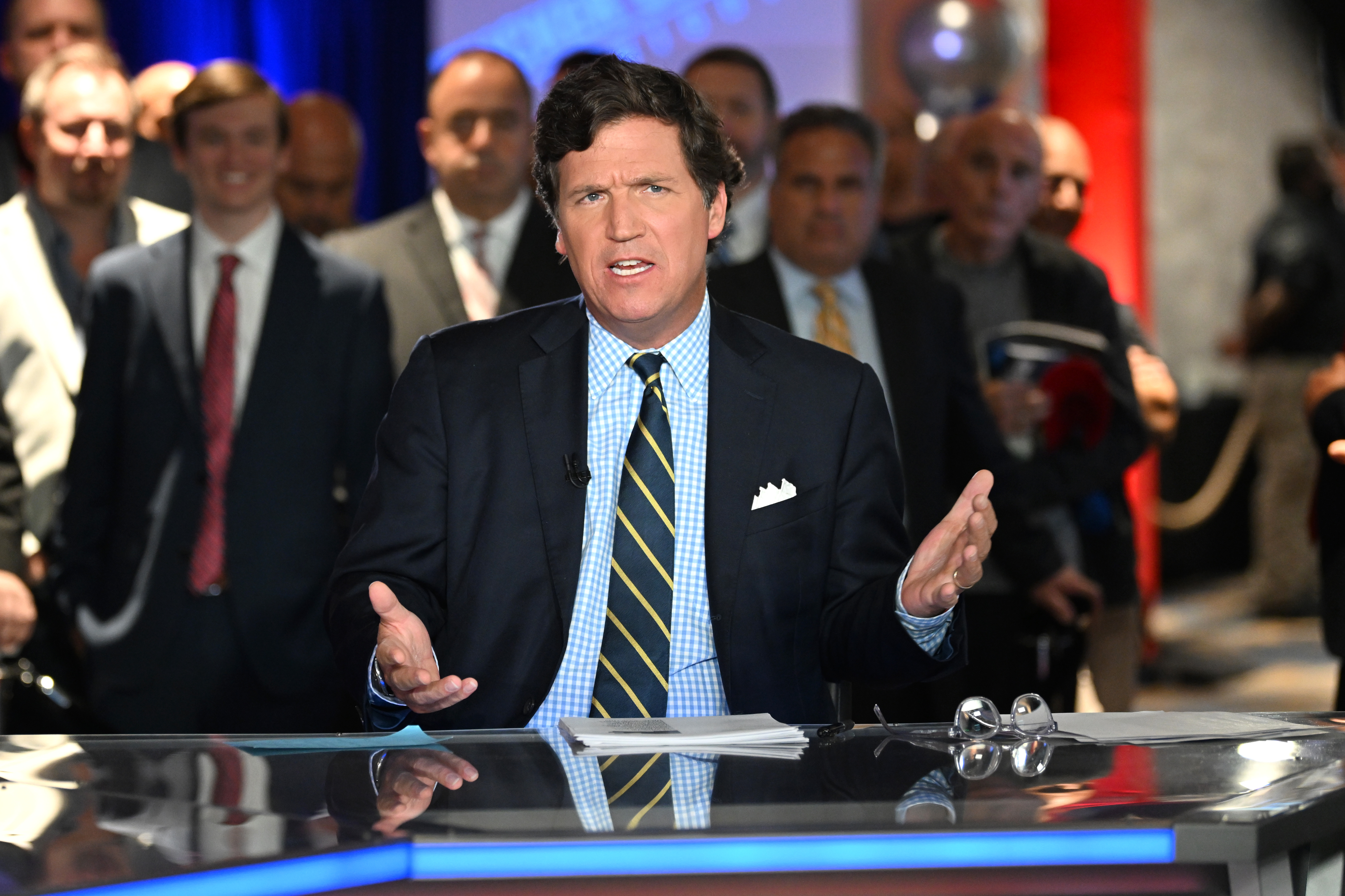 How Tucker Carlson mainstreamed fringe conspiracy theories : NPR