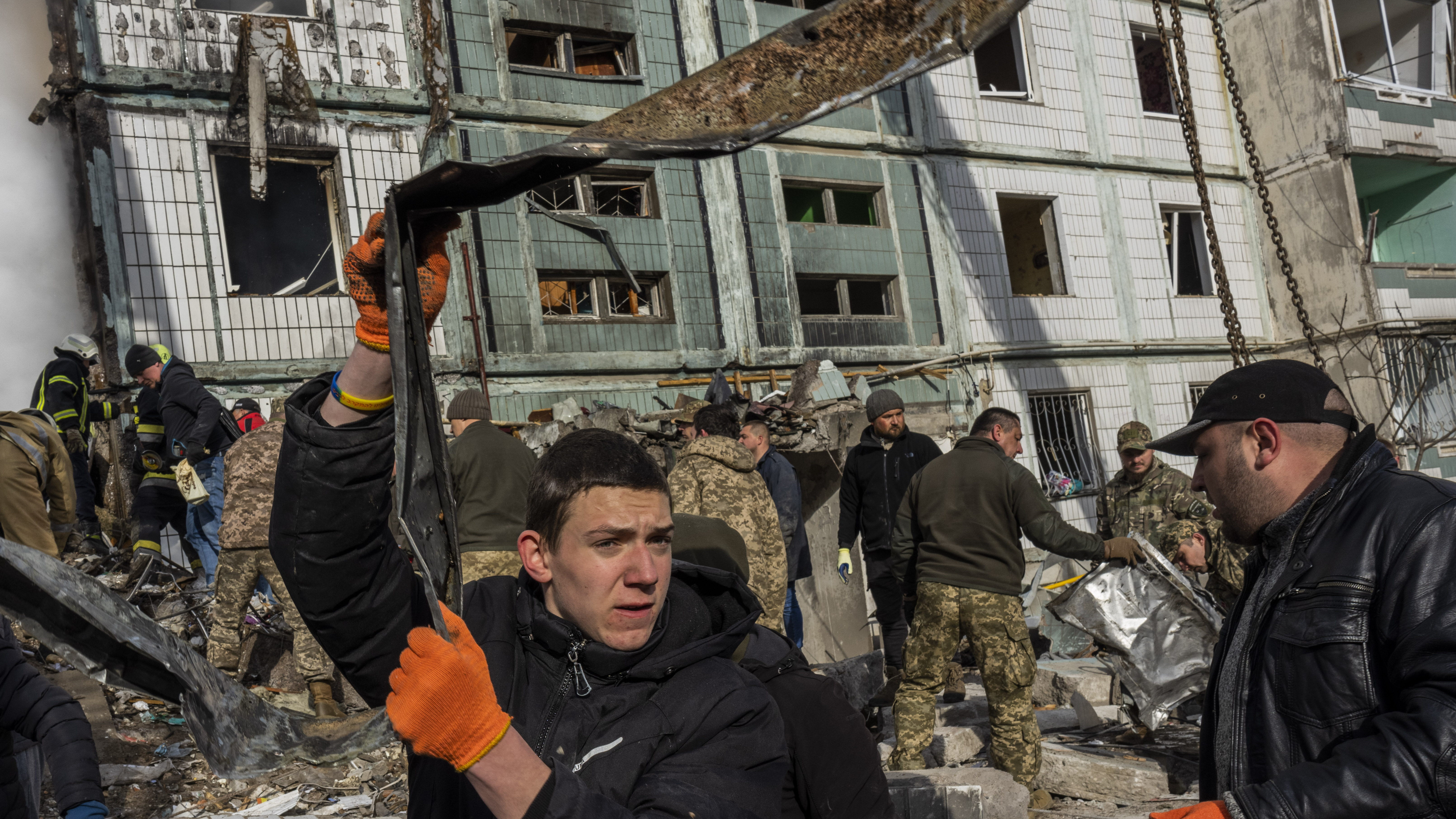 Missile and drone strikes across Ukraine claim at least a dozen lives