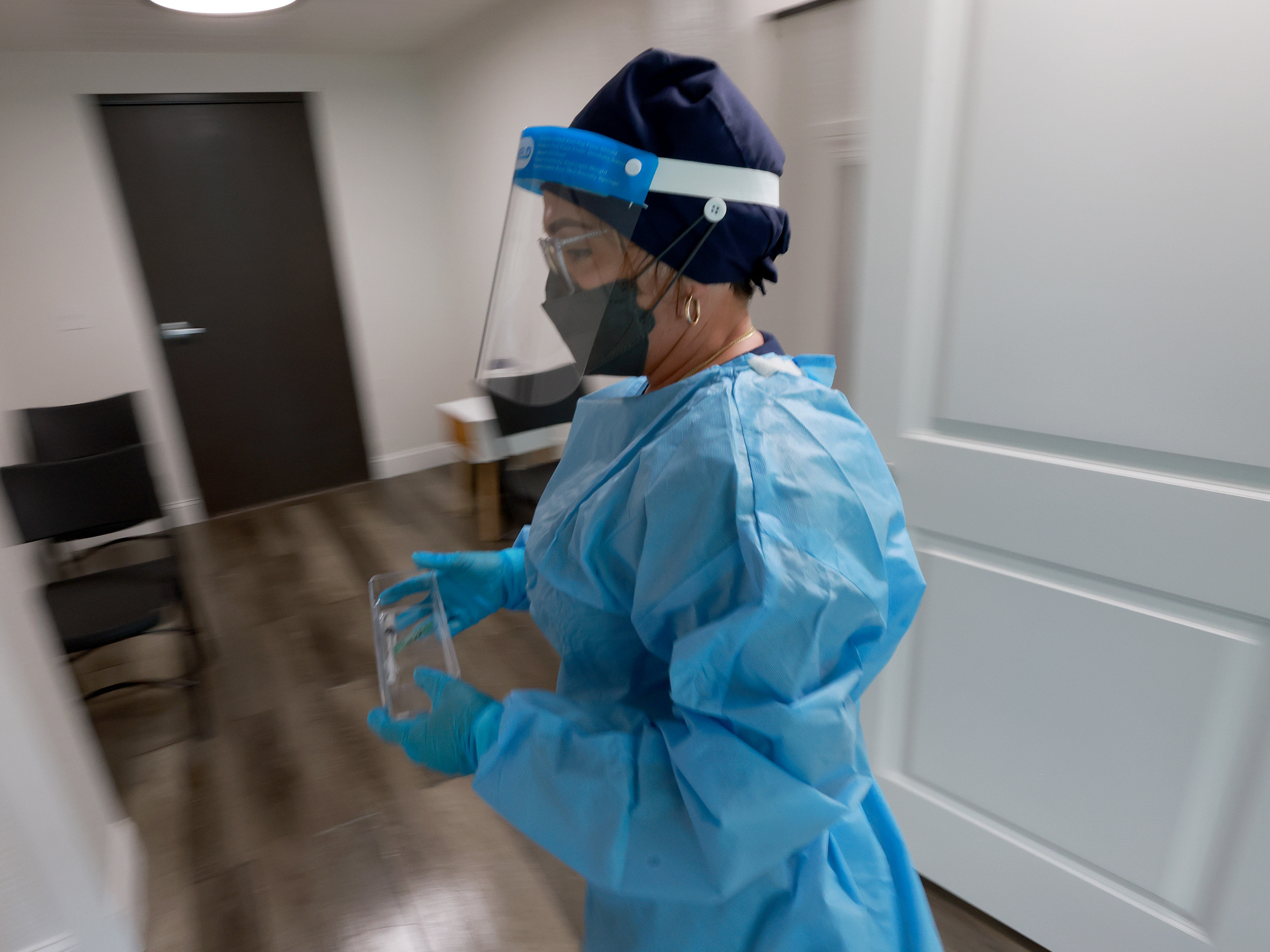 Miriala Gonzalez, a registered nurse in Miami, carries a monkeypox vaccine. A new survey highlights major concerns from nurses nationwide regarding future staffing levels in hospitals. (Getty Images)