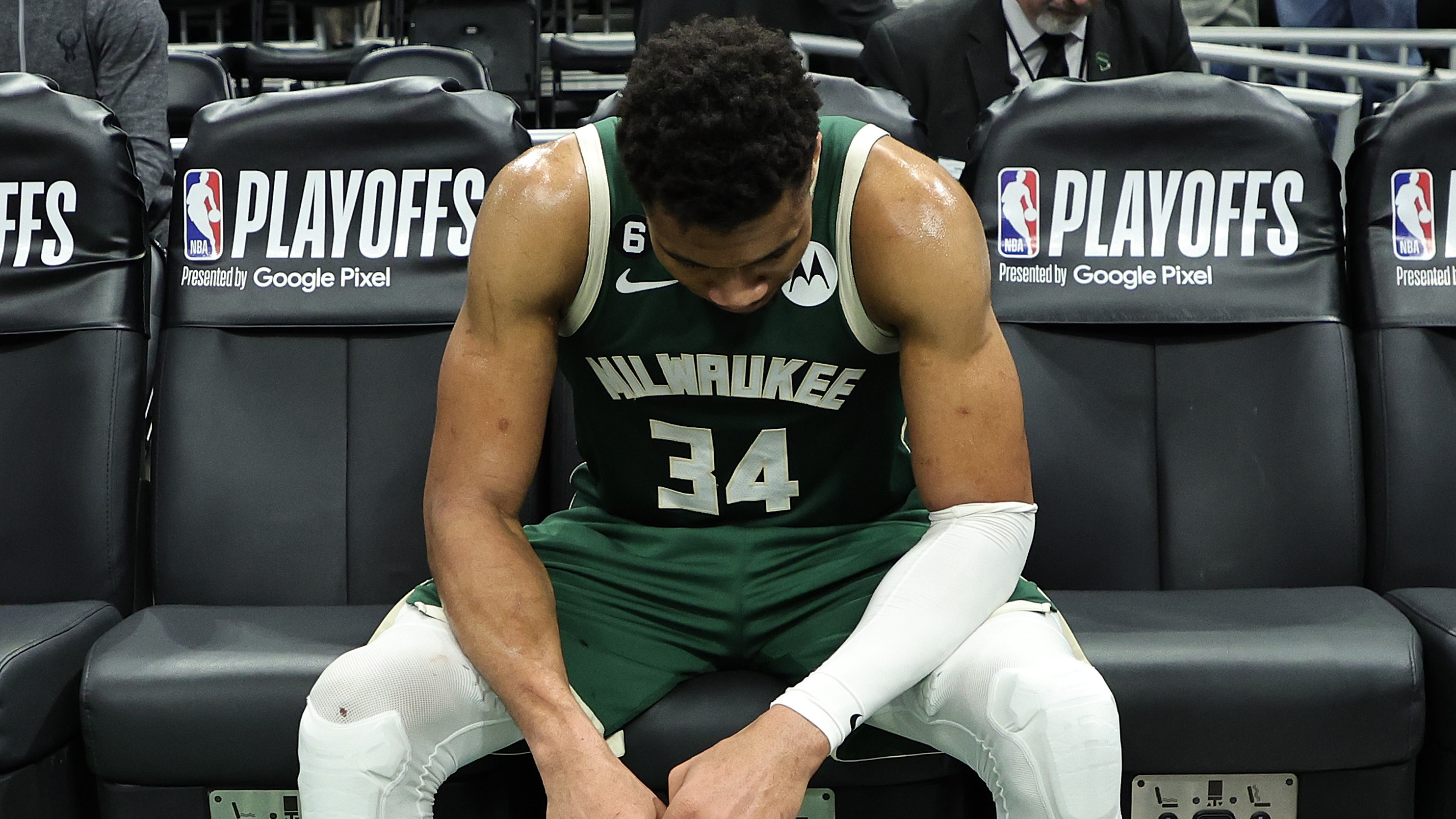 Giannis Antetokounmpo of the Milwaukee Bucks sits on the bench after losing Game 5 of the Eastern Conference First Round Playoffs against the Miami Heat in overtime.